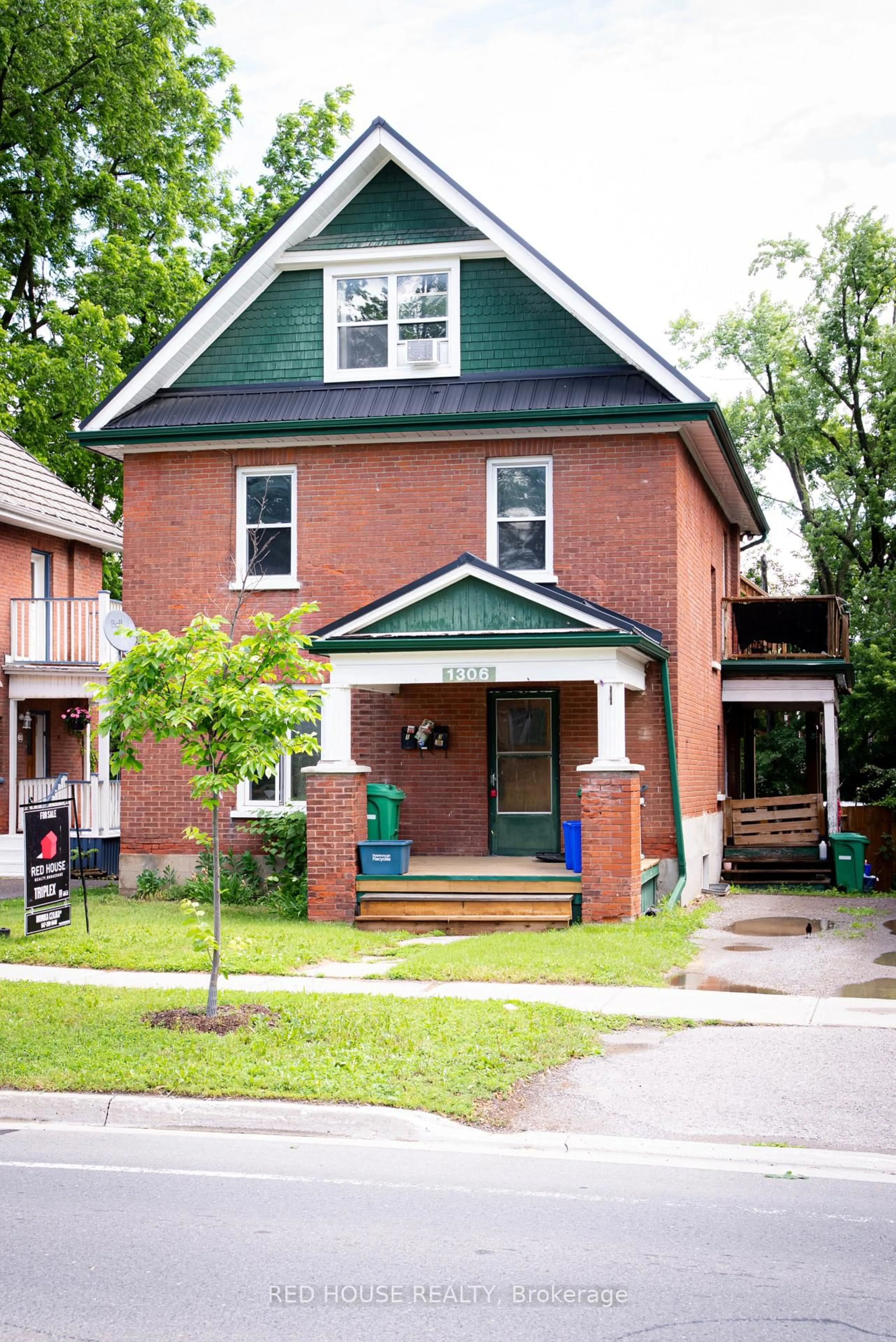 Home with brick exterior material, street for 1306 Monaghan Rd, Peterborough Ontario K9J 5M1