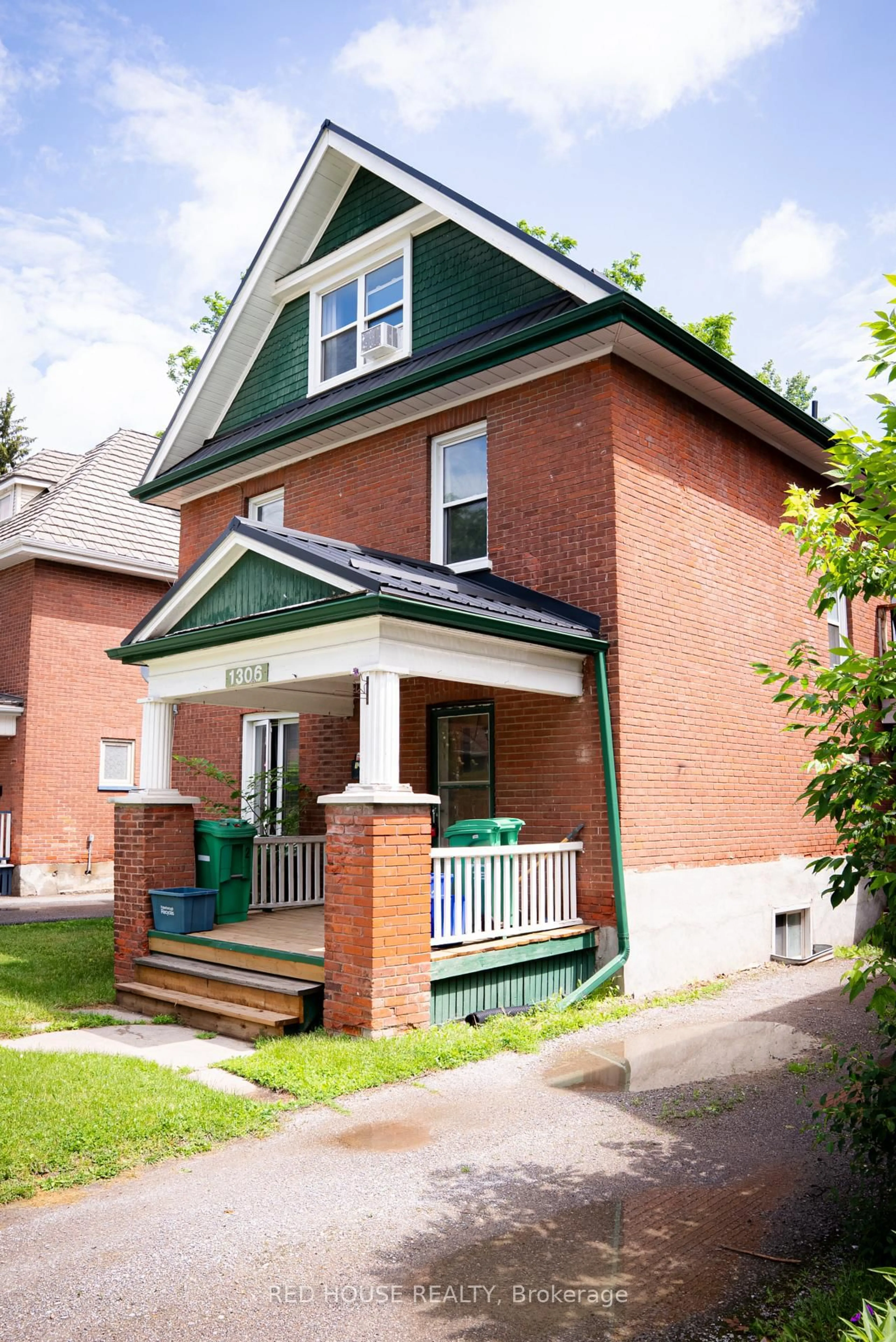 Home with brick exterior material, street for 1306 Monaghan Rd, Peterborough Ontario K9J 5M1