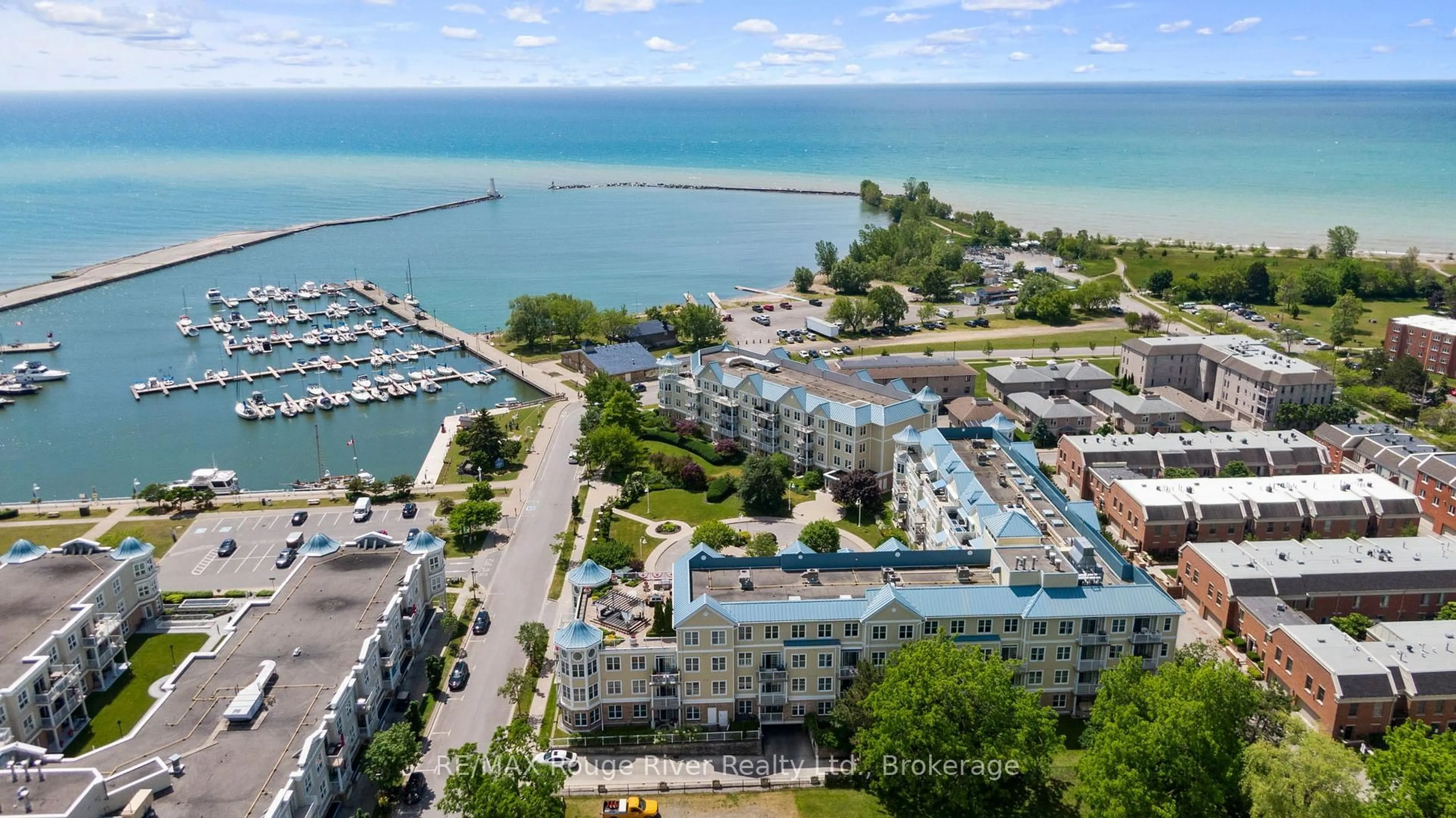 A pic from outside/outdoor area/front of a property/back of a property/a pic from drone, water/lake/river/ocean view for 145 Third St #102, Cobourg Ontario K9A 5X1