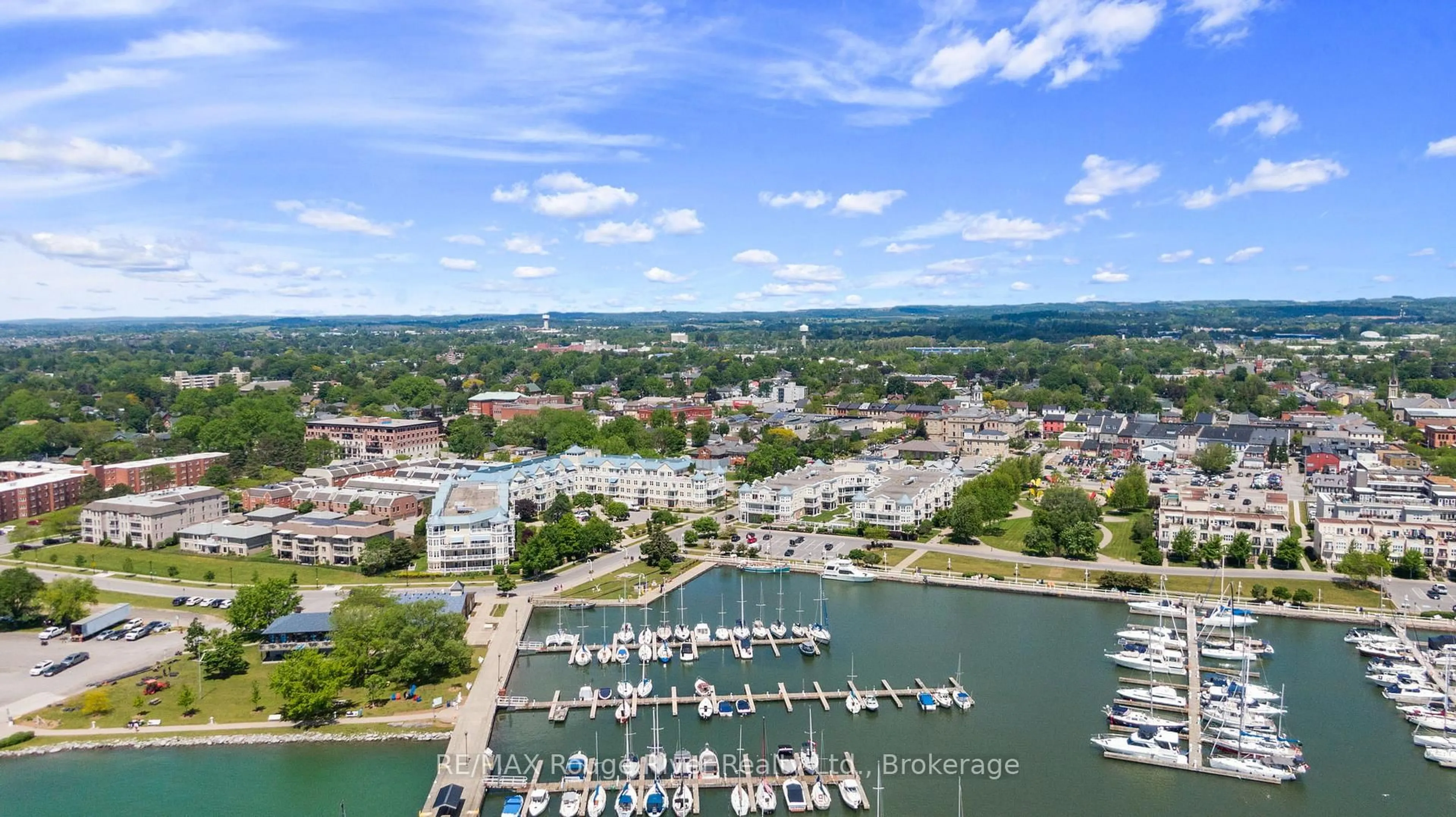 A pic from outside/outdoor area/front of a property/back of a property/a pic from drone, water/lake/river/ocean view for 145 Third St #102, Cobourg Ontario K9A 5X1