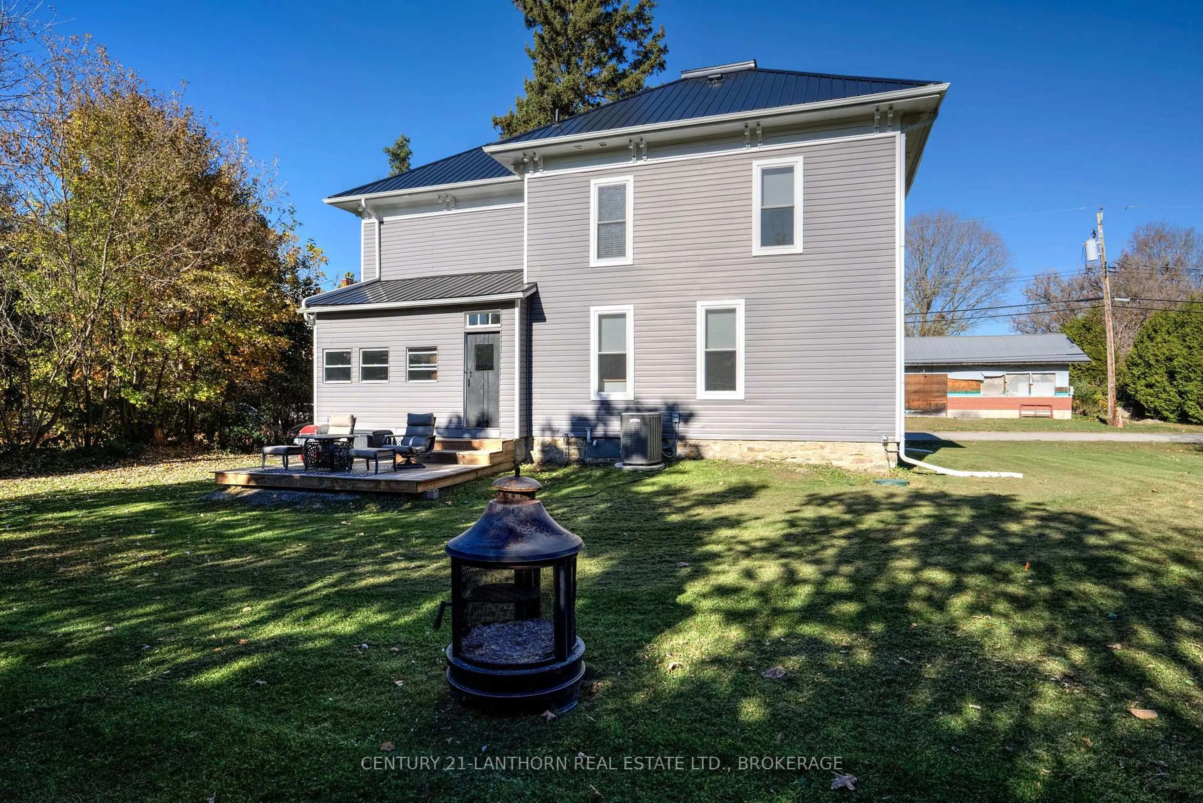 A pic from outside/outdoor area/front of a property/back of a property/a pic from drone, street for 2 John St, Rideau Lakes Ontario K0E 1G0