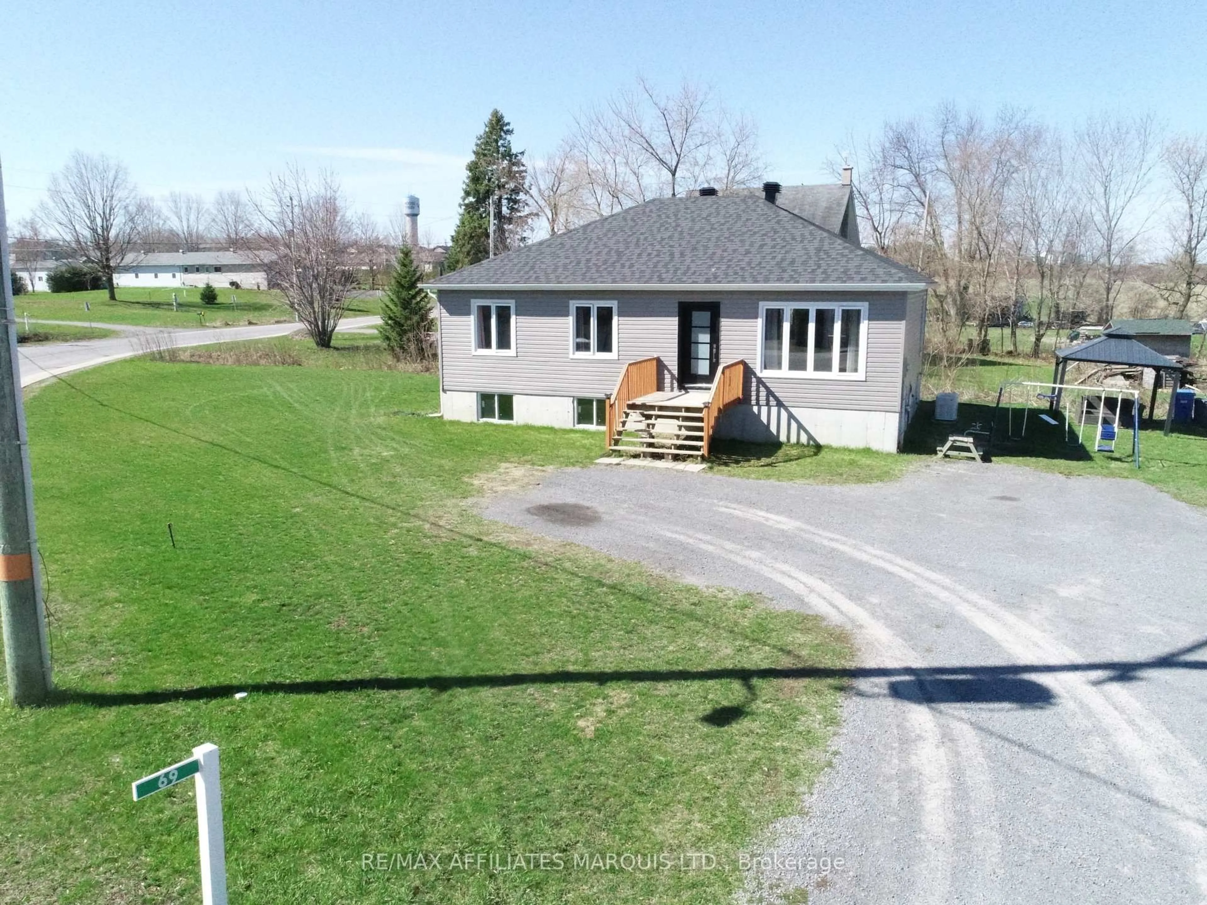 A pic from outside/outdoor area/front of a property/back of a property/a pic from drone, unknown for 69 St Polycarp St, North Stormont Ontario K0C 1W0
