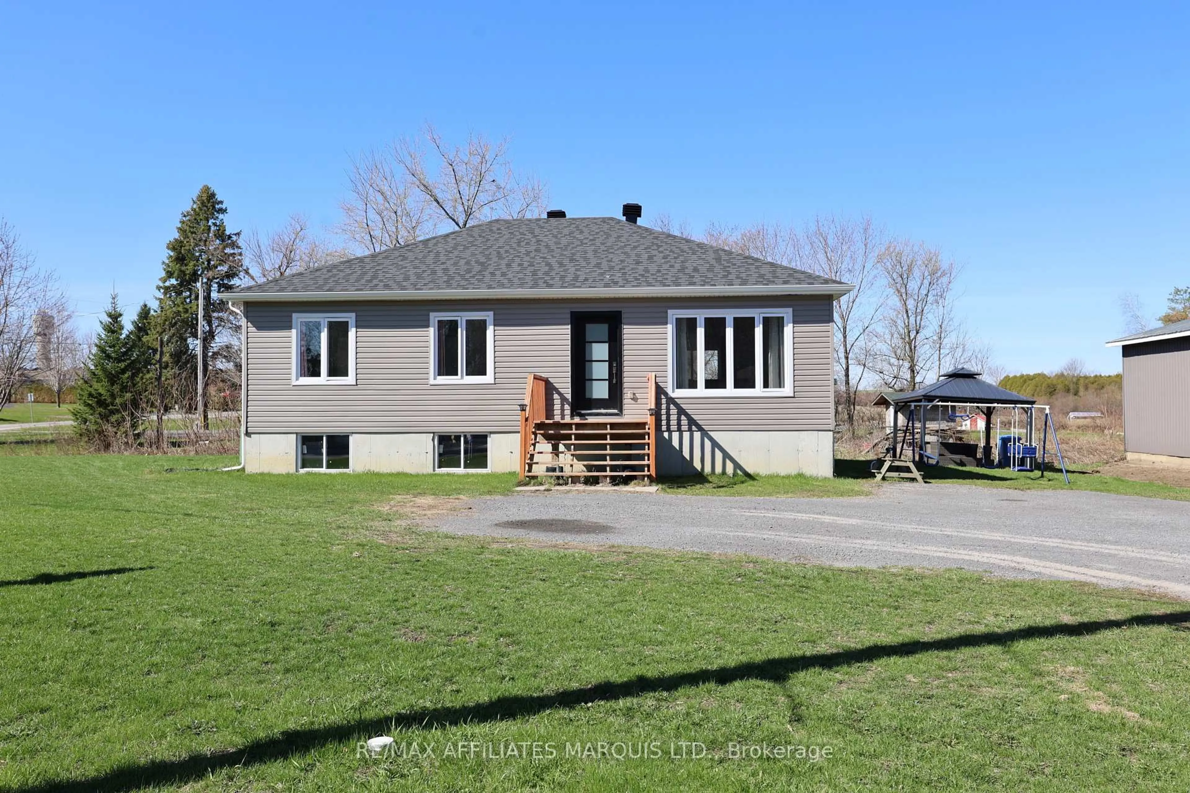 Home with vinyl exterior material, street for 69 St Polycarp St, North Stormont Ontario K0C 1W0