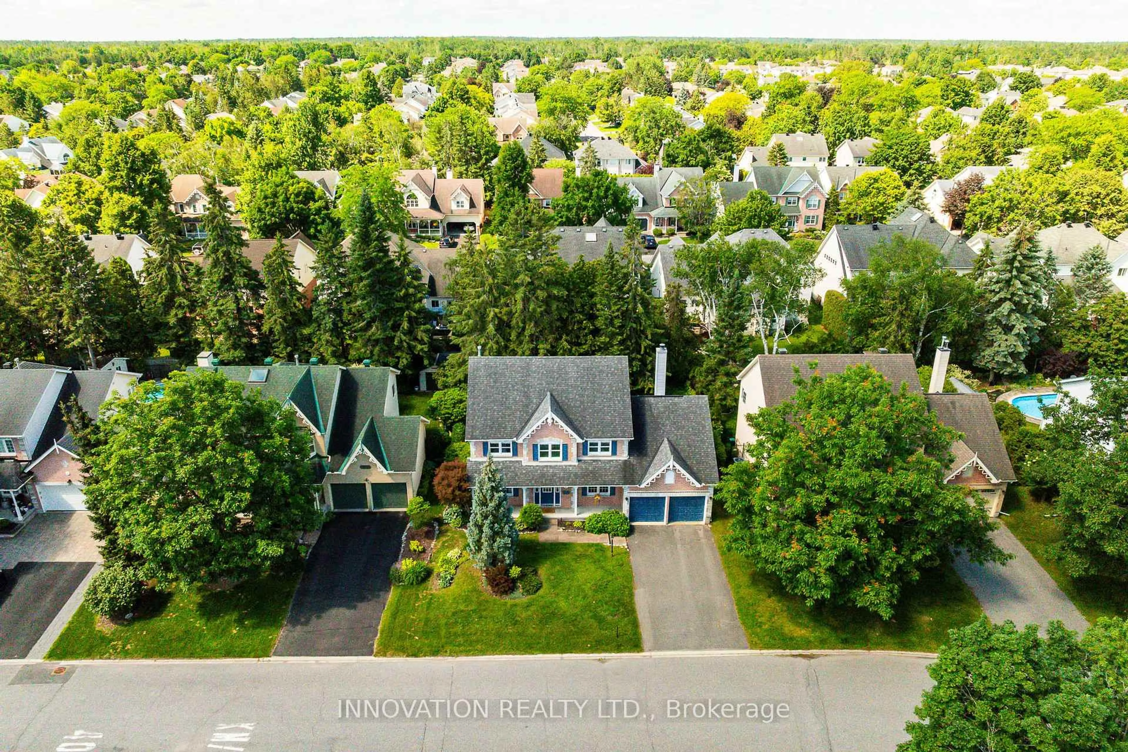 A pic from outside/outdoor area/front of a property/back of a property/a pic from drone, street for 12 Wendell Ave, Stittsville Ontario K2S 1G9