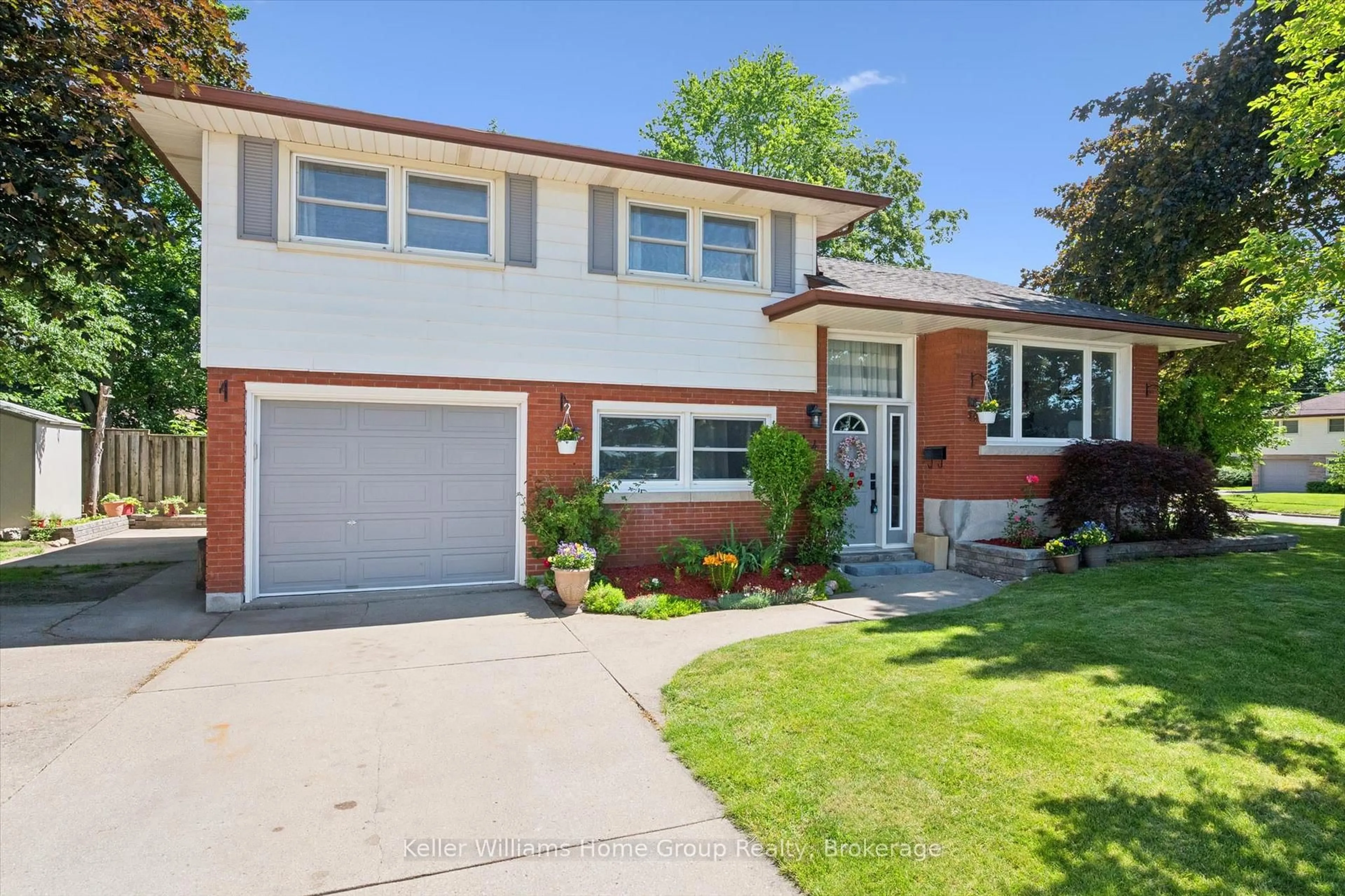 Home with brick exterior material, street for 44 Meyer Dr, Guelph Ontario N1E 4H2