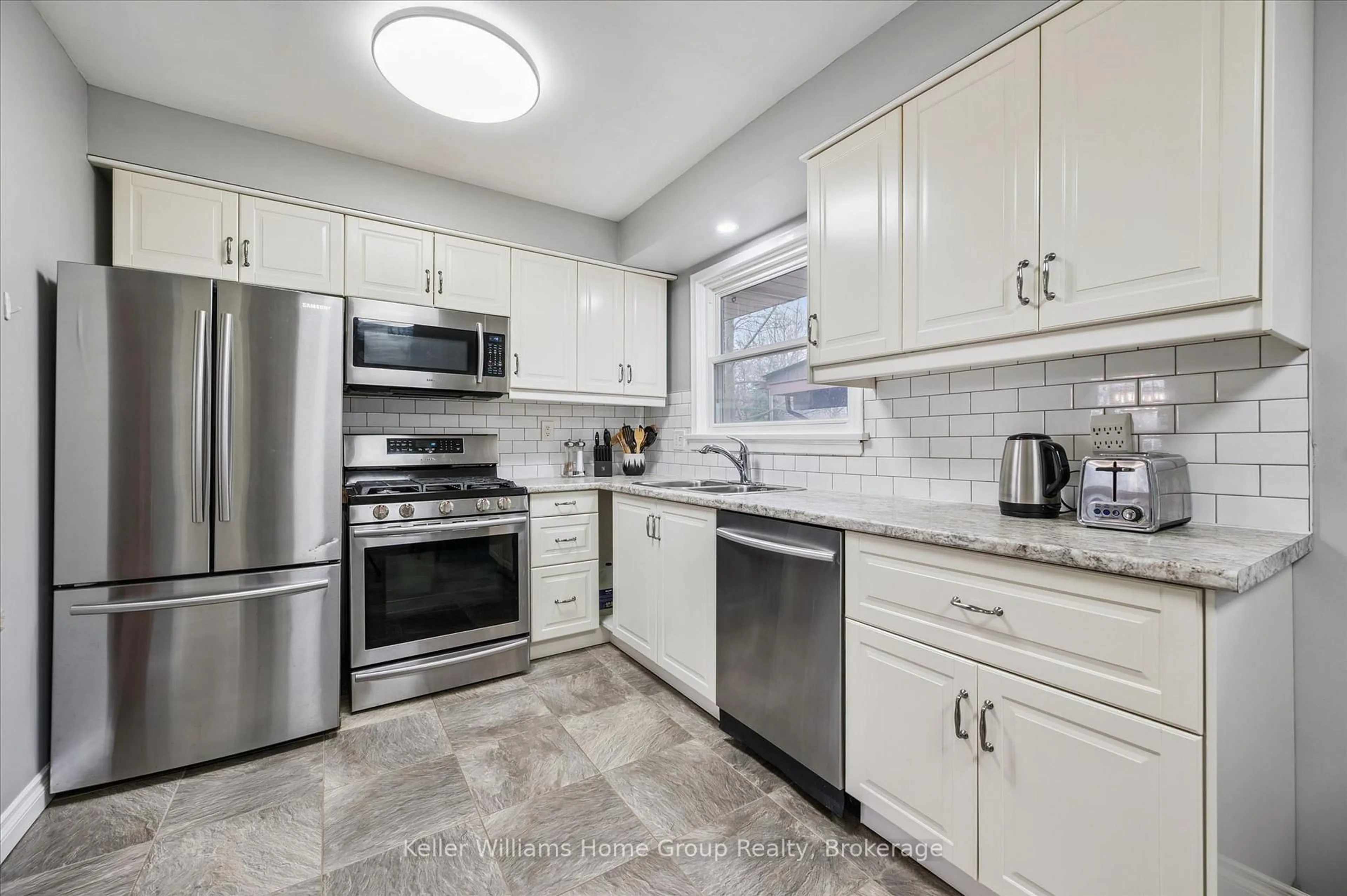 Standard kitchen, ceramic/tile floor for 44 Meyer Dr, Guelph Ontario N1E 4H2