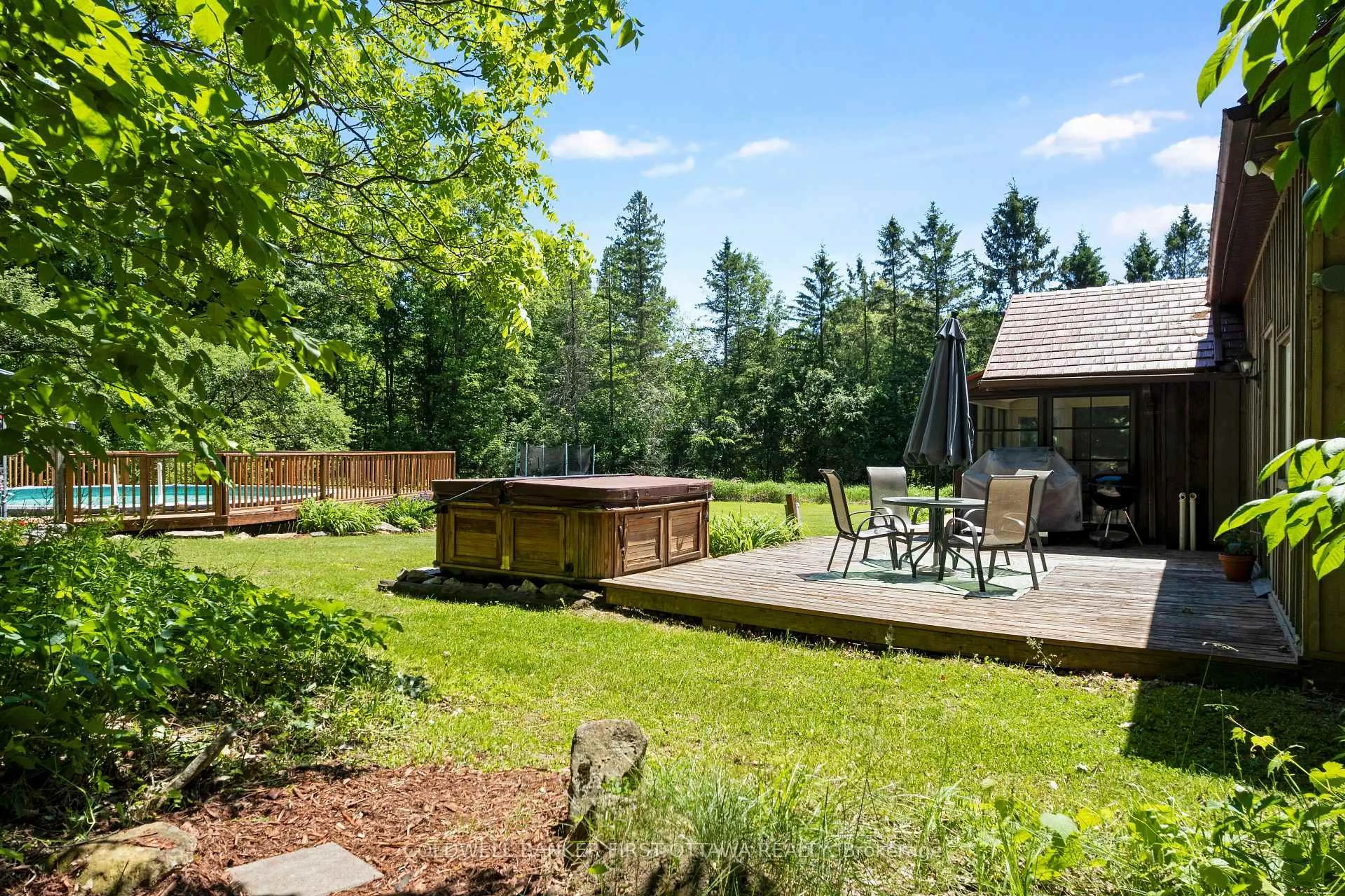 Patio, forest/trees view for 1358 Rideau Ferry Rd, Perth Ontario K7H 3C7