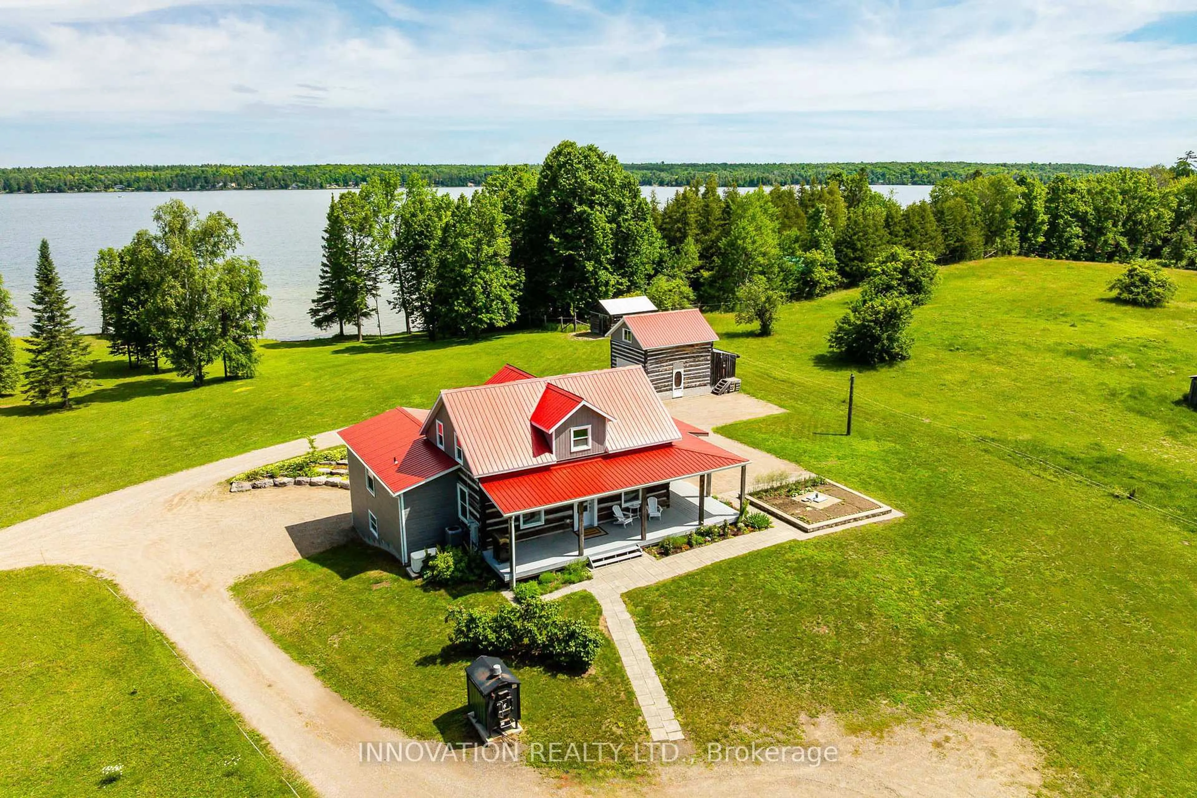 A pic from outside/outdoor area/front of a property/back of a property/a pic from drone, water/lake/river/ocean view for 172 Mink Lake Rd, Eganville Ontario K0J 1T0