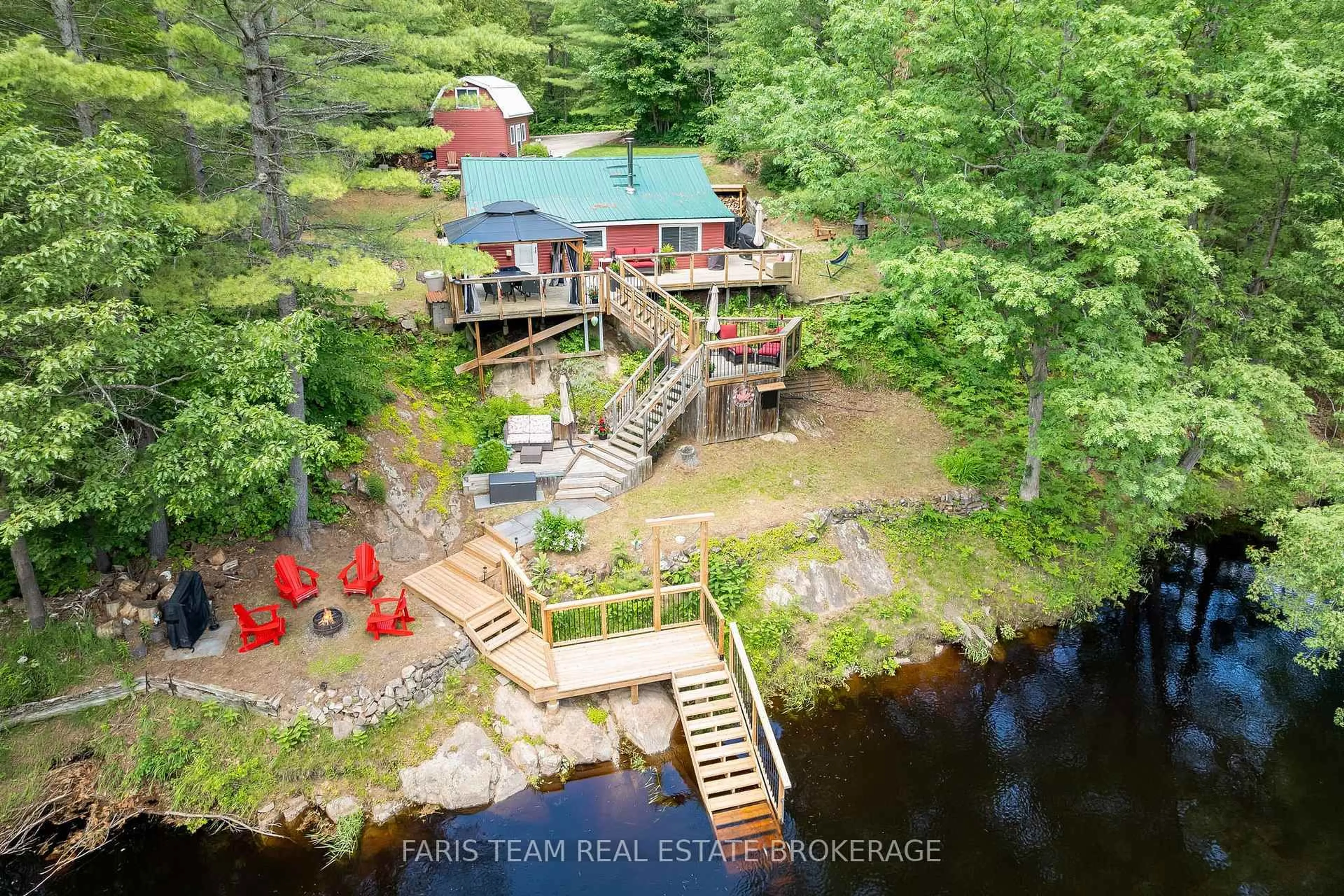 A pic from outside/outdoor area/front of a property/back of a property/a pic from drone, water/lake/river/ocean view for 24 Black River Rd, Kawartha Lakes Ontario L0K 2B0