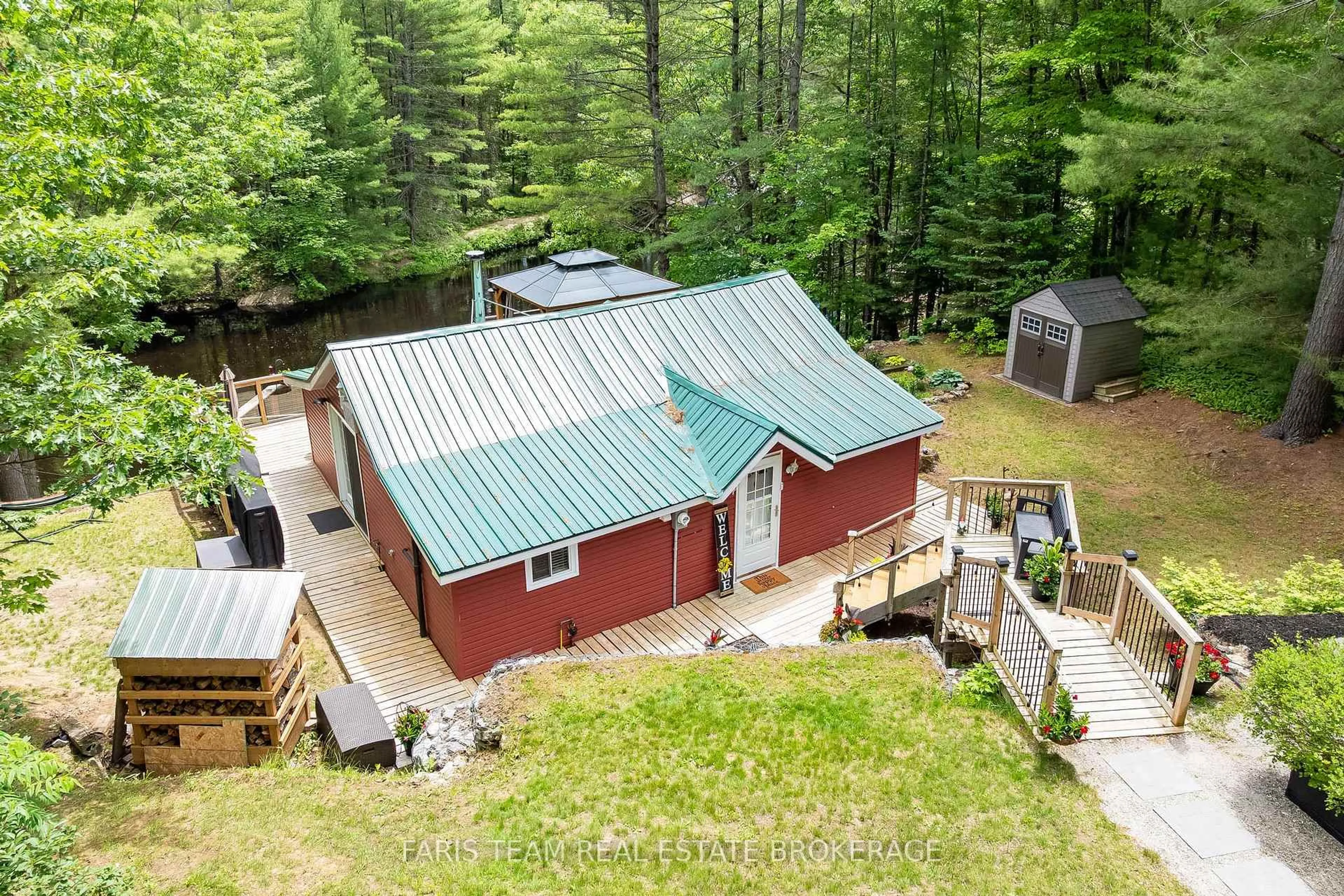 A pic from outside/outdoor area/front of a property/back of a property/a pic from drone, unknown for 24 Black River Rd, Kawartha Lakes Ontario L0K 2B0