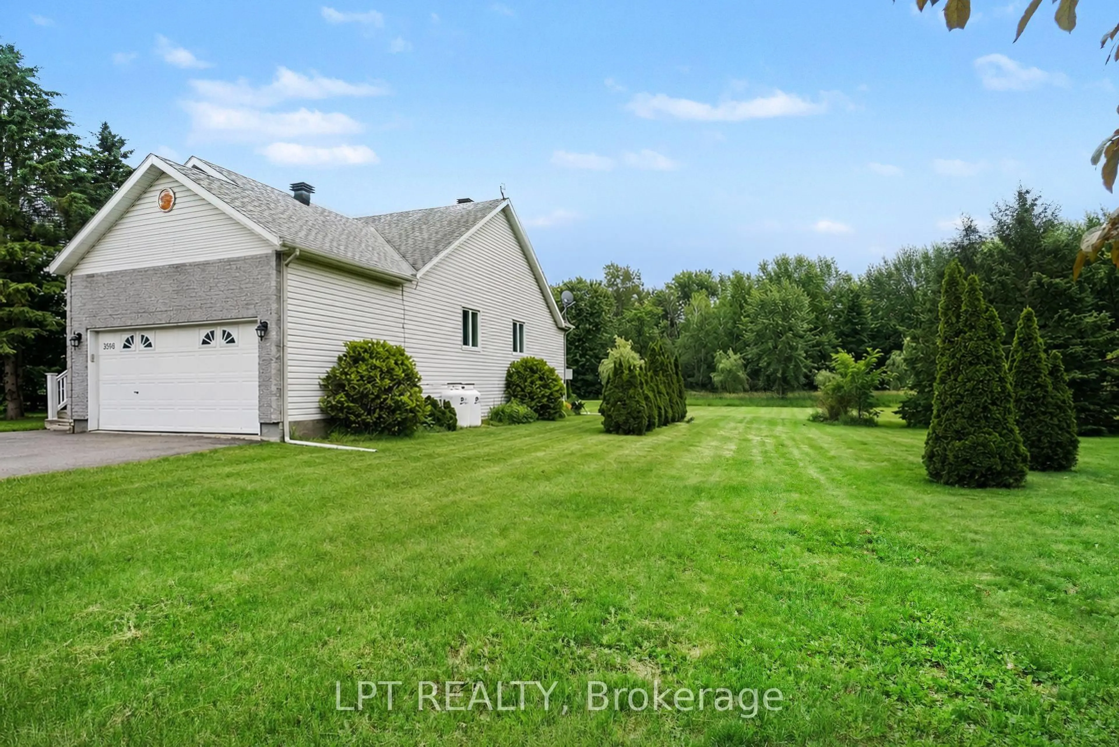 A pic from outside/outdoor area/front of a property/back of a property/a pic from drone, water/lake/river/ocean view for 3898 Etienne Rd, Sarsfield Ontario K0A 3E0