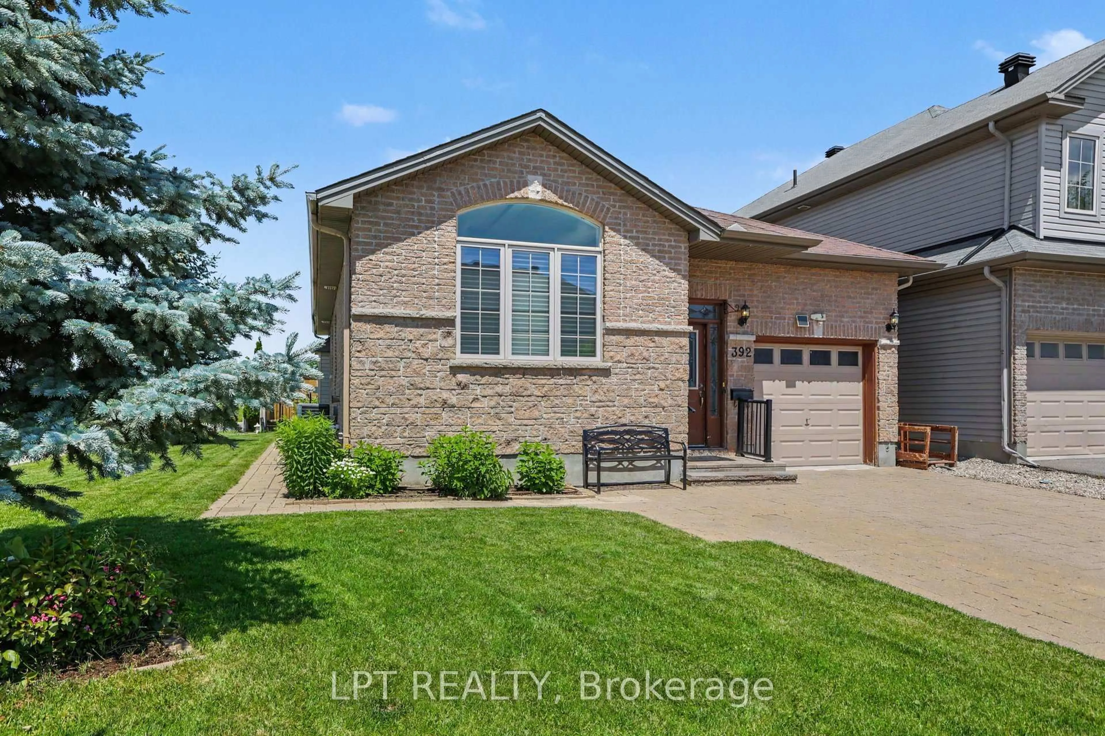 Home with brick exterior material, water/lake/river/ocean view for 392 Bamburgh Way, Ottawa Ontario K2J 6A6