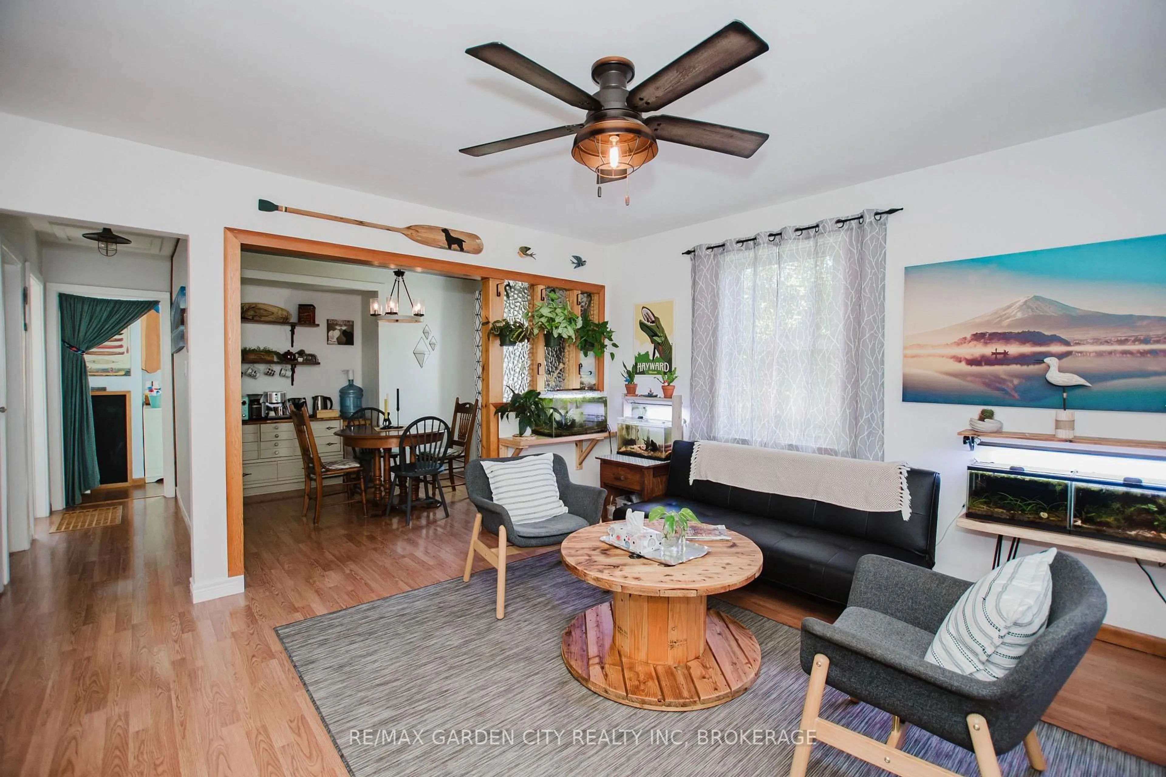 Living room with furniture, wood/laminate floor for 9 Blain Pl, St. Catharines Ontario L2P 2R6