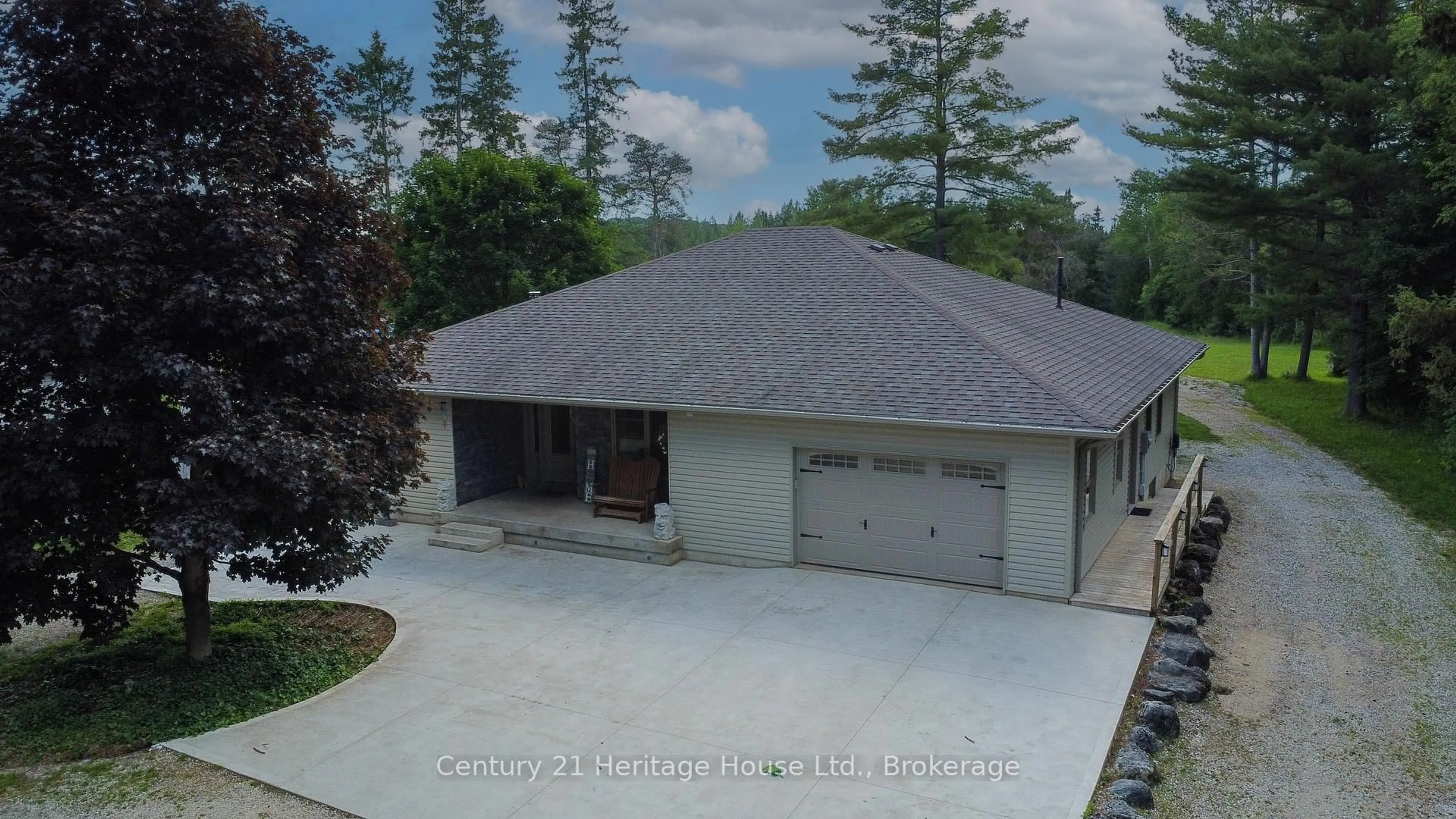 A pic from outside/outdoor area/front of a property/back of a property/a pic from drone, street for 314844 6 Highway, West Grey Ontario N0G 1R0