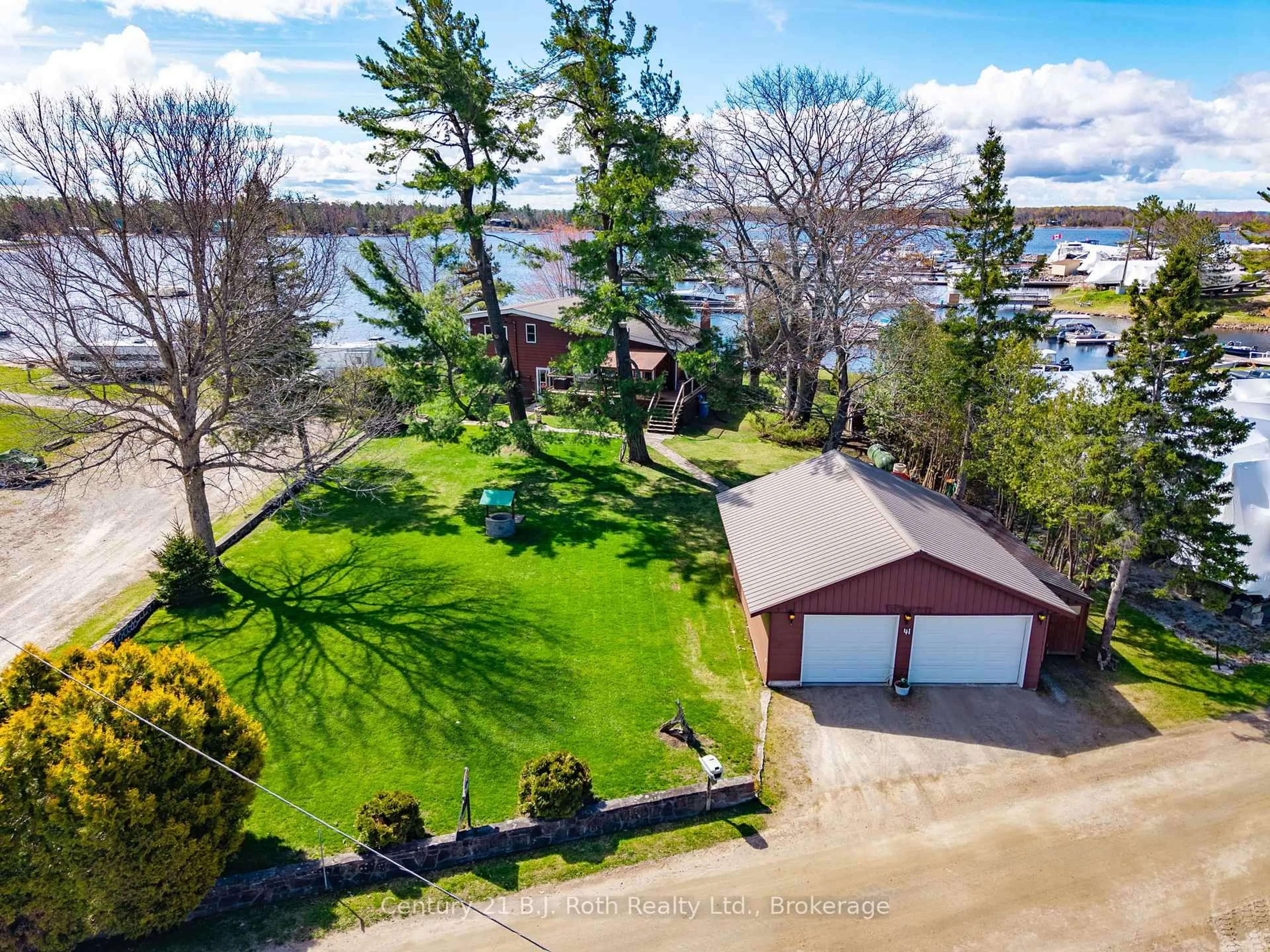 A pic from outside/outdoor area/front of a property/back of a property/a pic from drone, water/lake/river/ocean view for 41 Brandy's Island Rd, Georgian Bay Ontario P0E 1E0