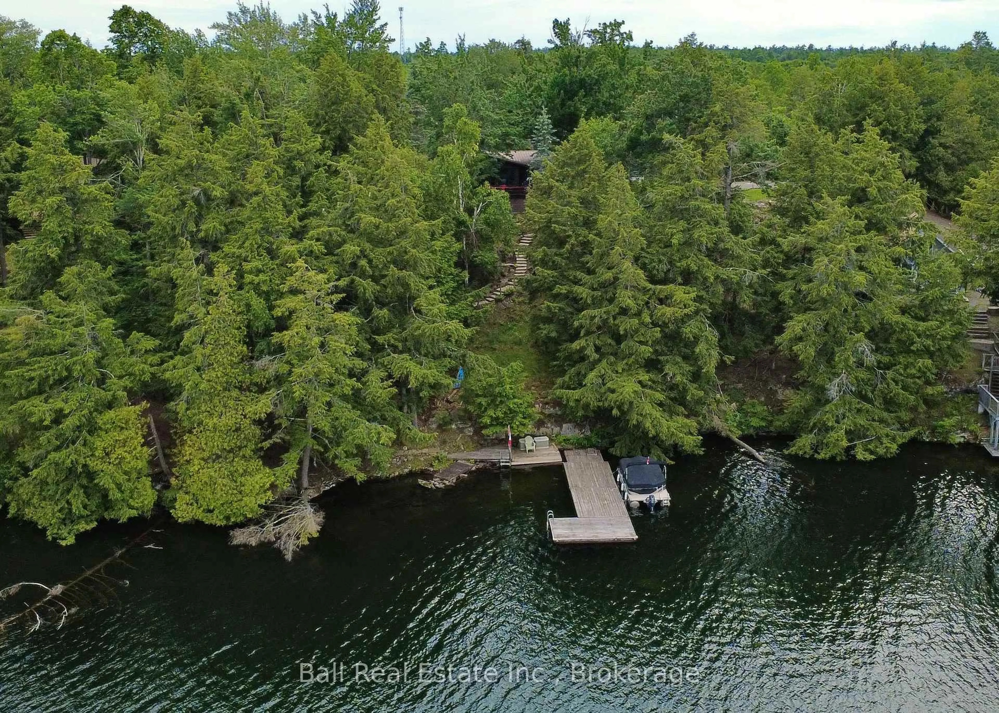 A pic from outside/outdoor area/front of a property/back of a property/a pic from drone, water/lake/river/ocean view for 43 Fire Route 52A, North Kawartha Ontario K0L 1A0