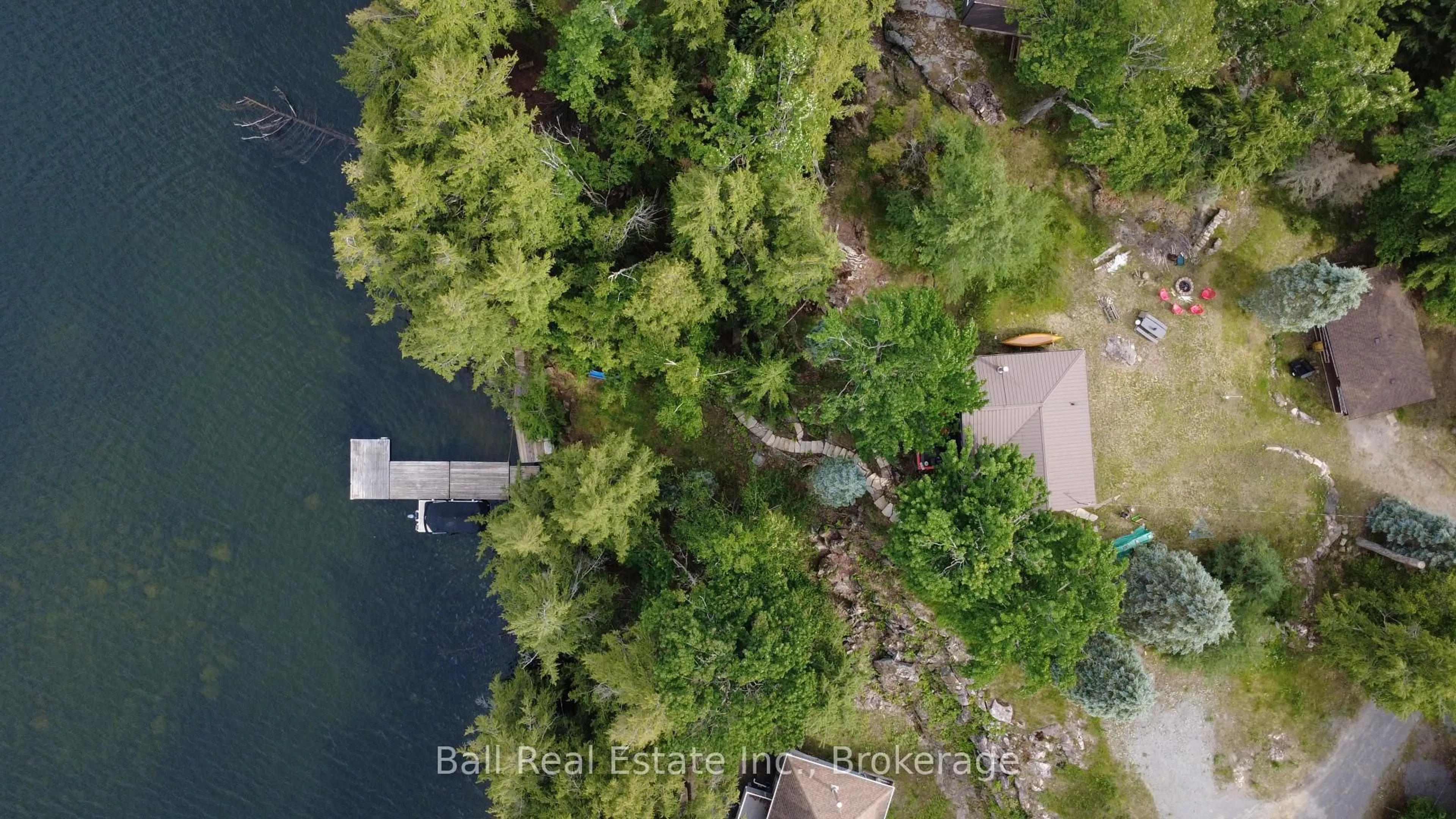 A pic from outside/outdoor area/front of a property/back of a property/a pic from drone, water/lake/river/ocean view for 43 Fire Route 52A, North Kawartha Ontario K0L 1A0