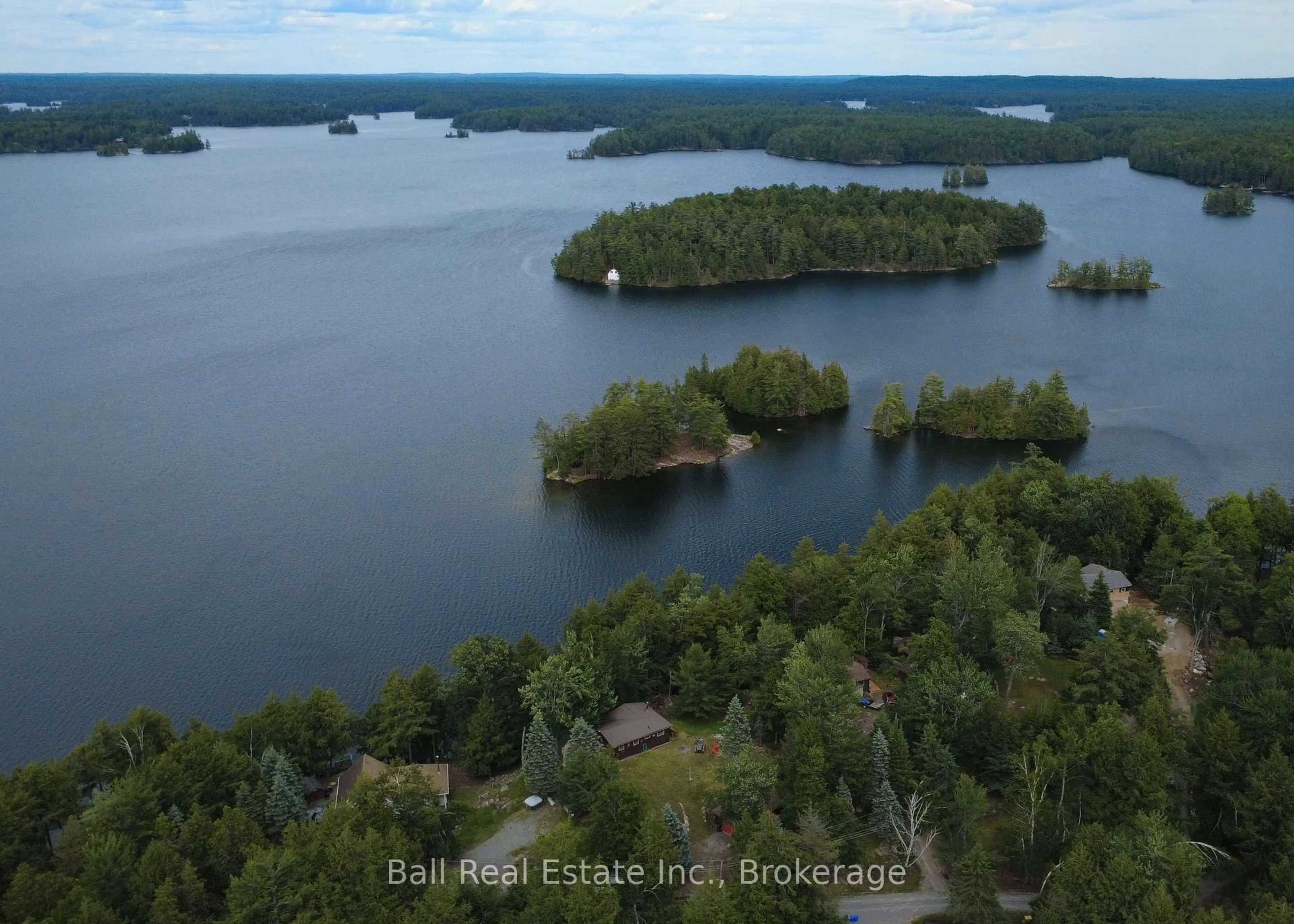 A pic from outside/outdoor area/front of a property/back of a property/a pic from drone, water/lake/river/ocean view for 43 Fire Route 52A, North Kawartha Ontario K0L 1A0
