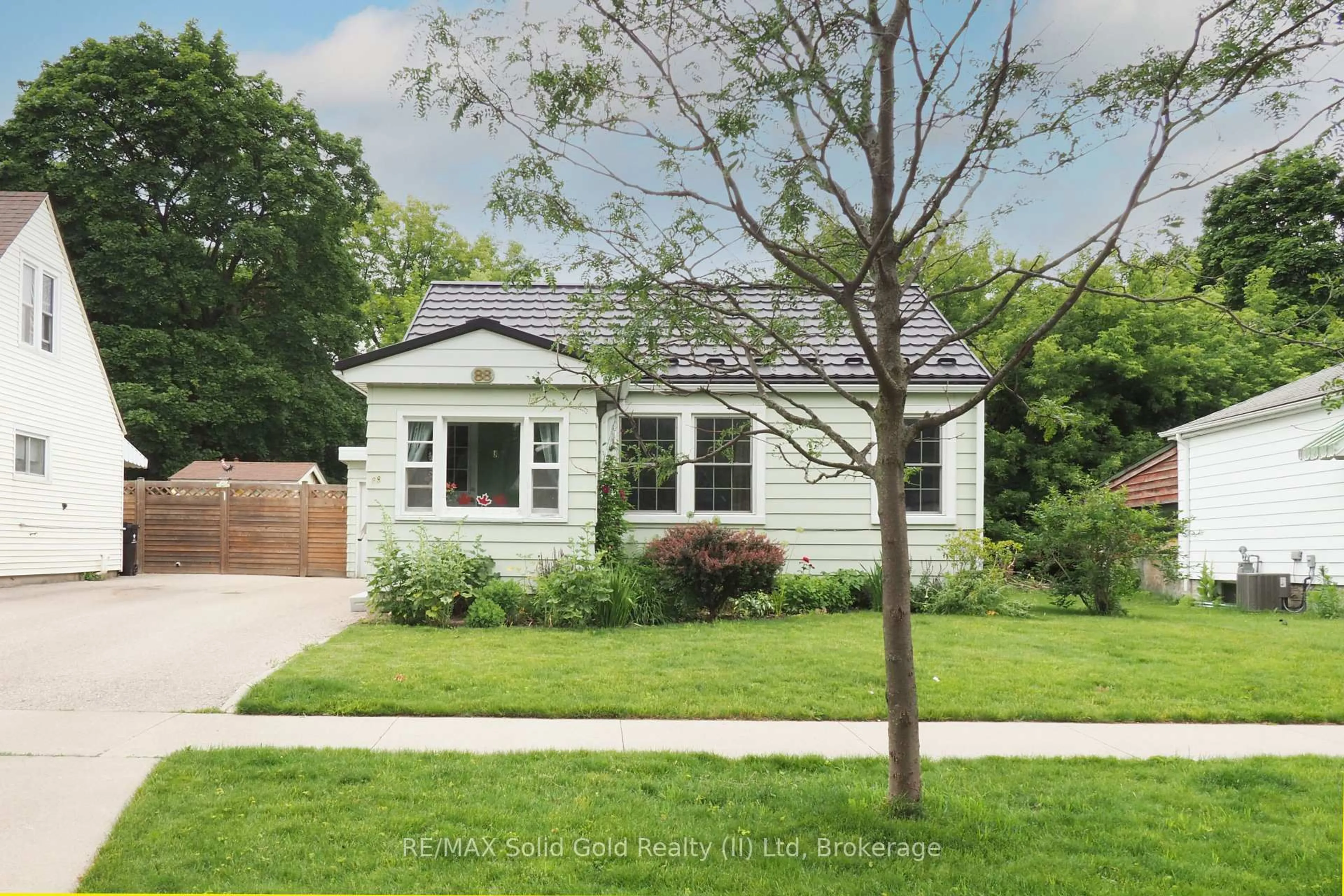Home with vinyl exterior material, street for 88 Glen Rd, Kitchener Ontario N2M 3E8