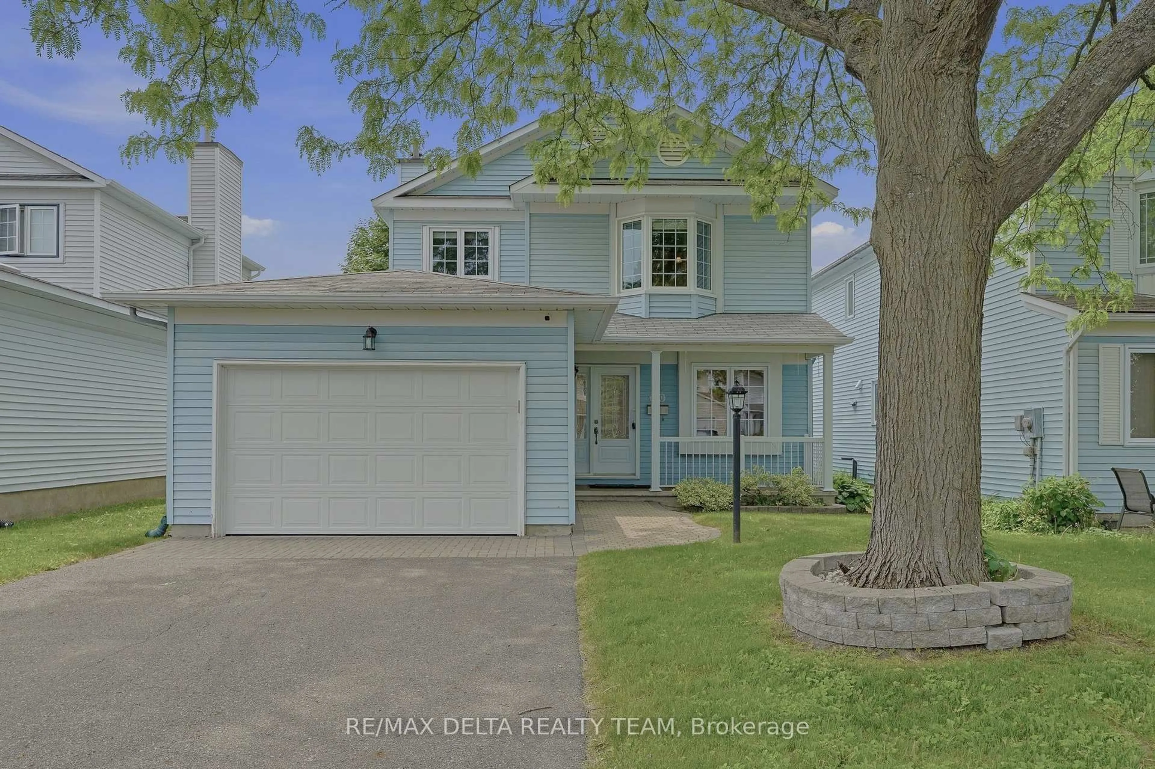 Home with vinyl exterior material, street for 310 Mceachern Cres, Orleans Ontario K1E 3K2