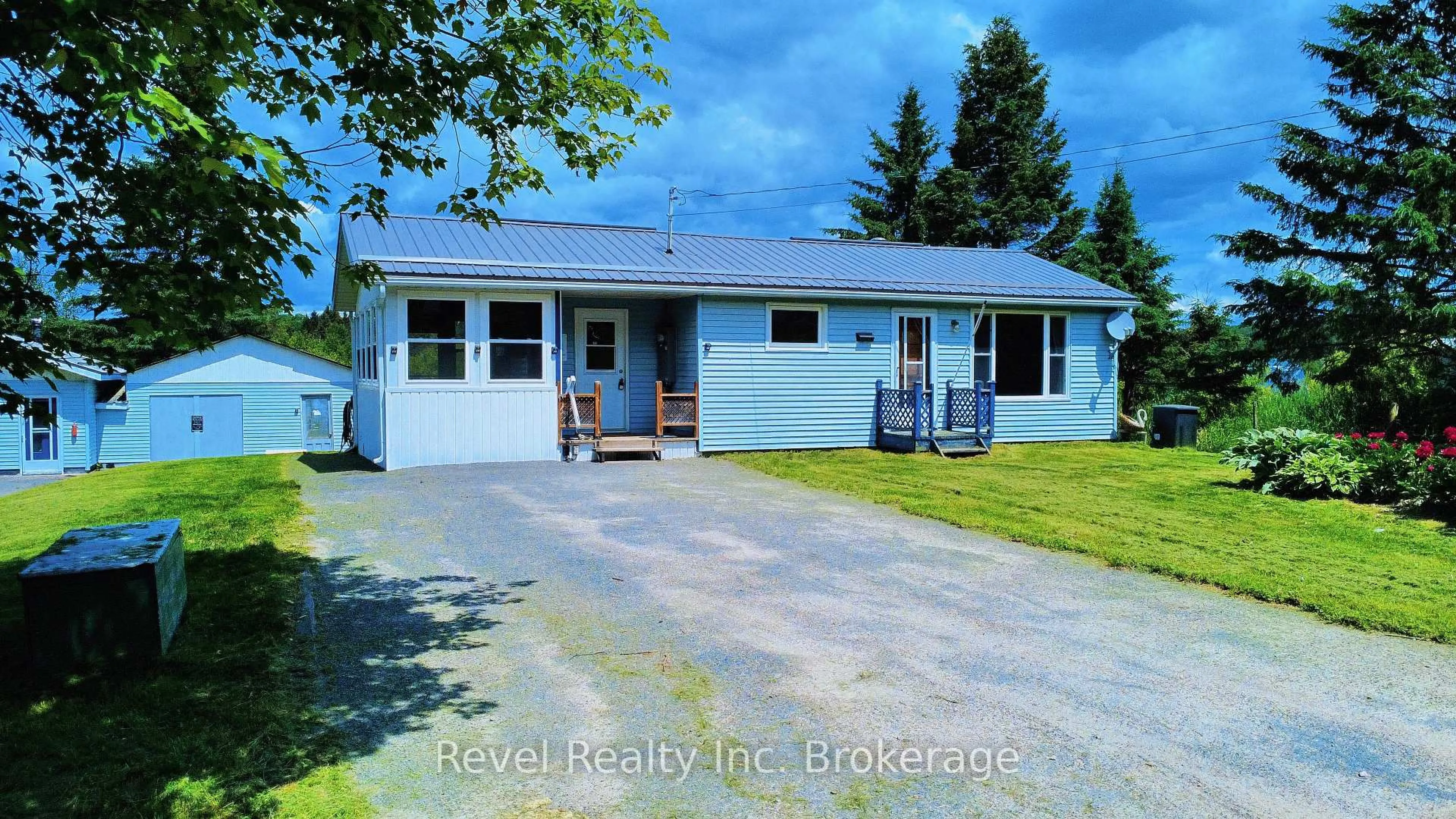 A pic from outside/outdoor area/front of a property/back of a property/a pic from drone, street for 2816 Chiswick Line, Chisholm Ontario P0H 1Z0