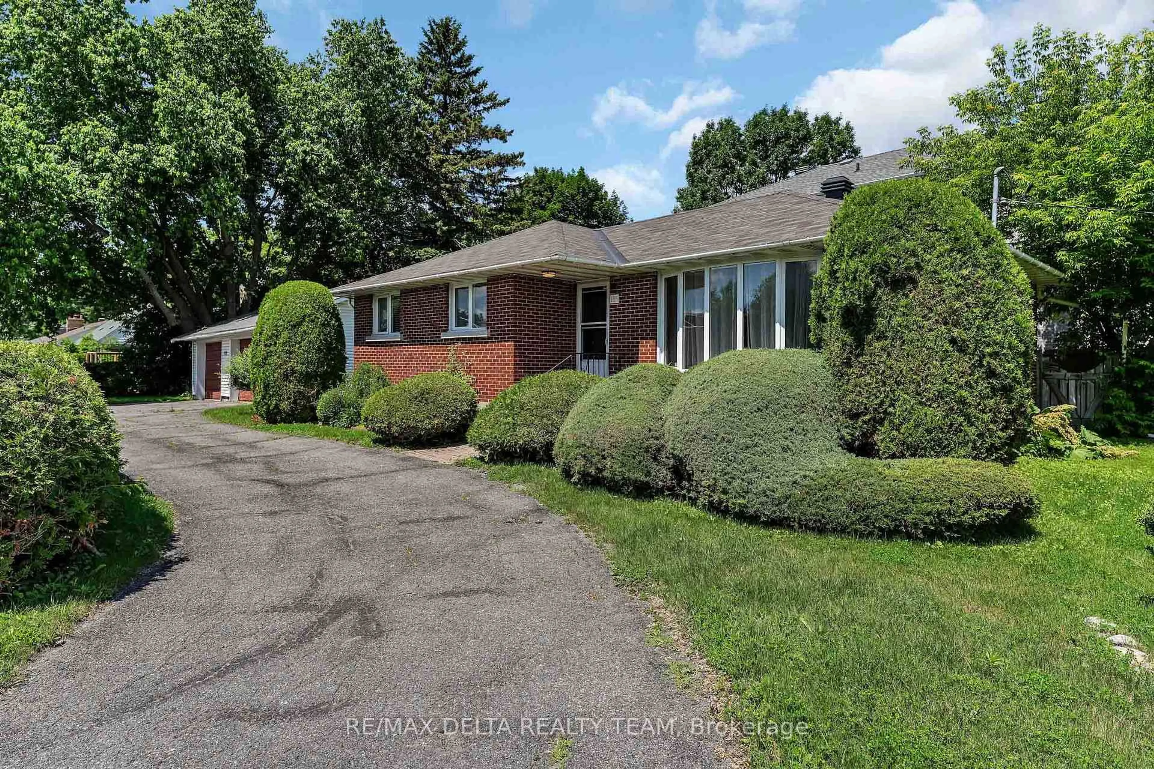 Home with brick exterior material, street for 115 Meadowlands Dr, Ottawa Ontario K2G 2S2