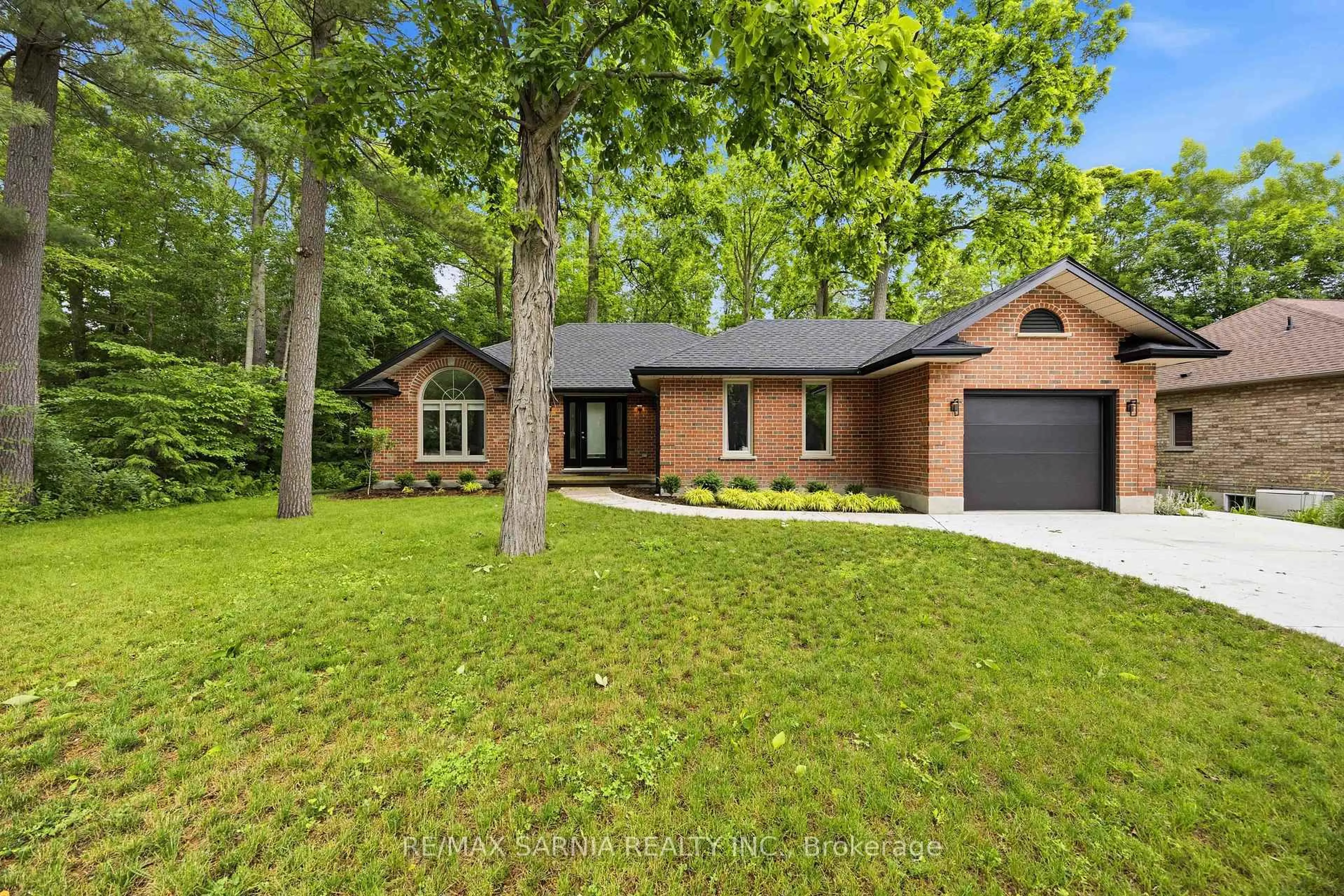 Home with brick exterior material, street for 10172 MEADOWLILLY Cres, Lambton Shores Ontario N0M 1T0