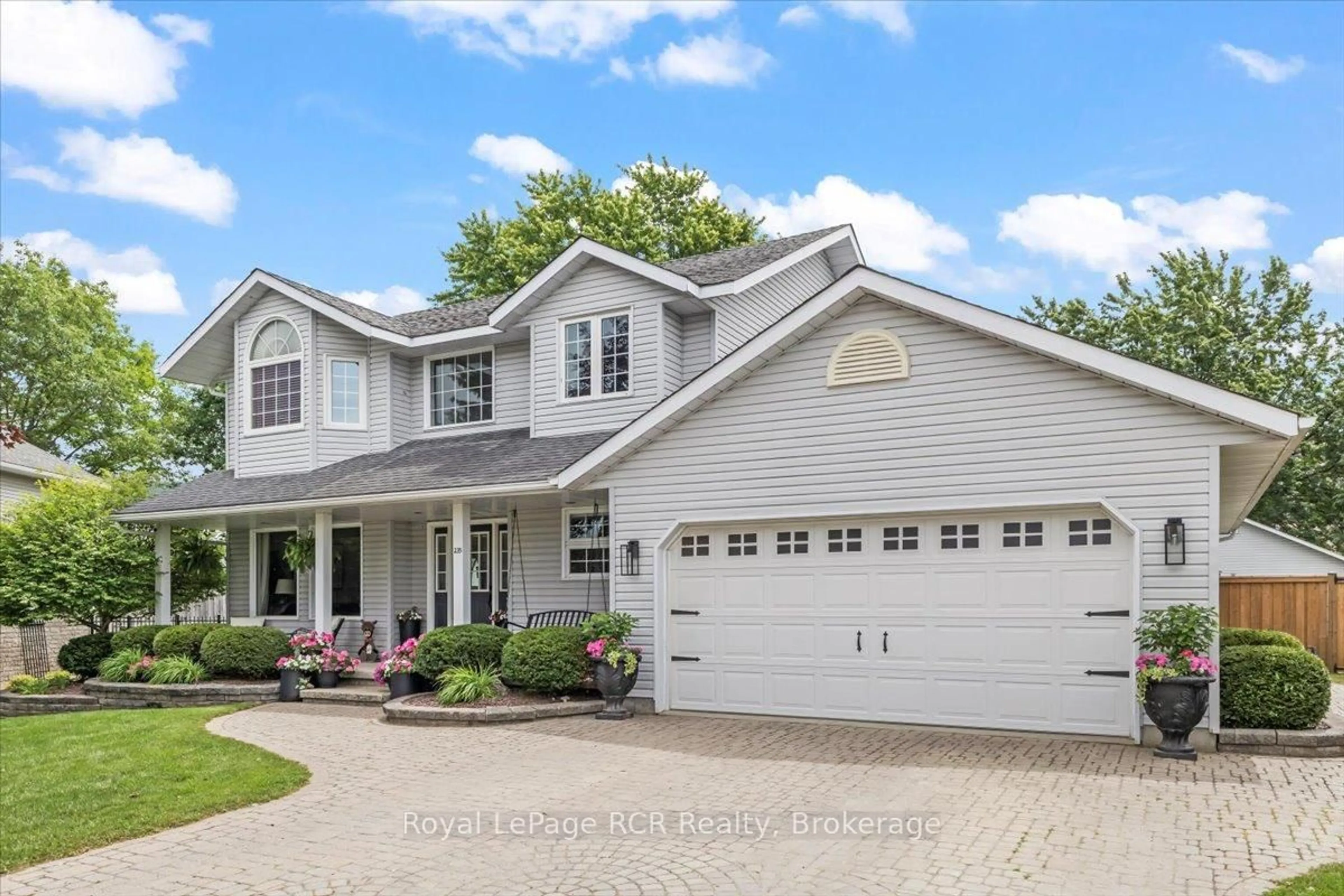 Home with vinyl exterior material, street for 235 4th Street Cres, Hanover Ontario N4N 3S2