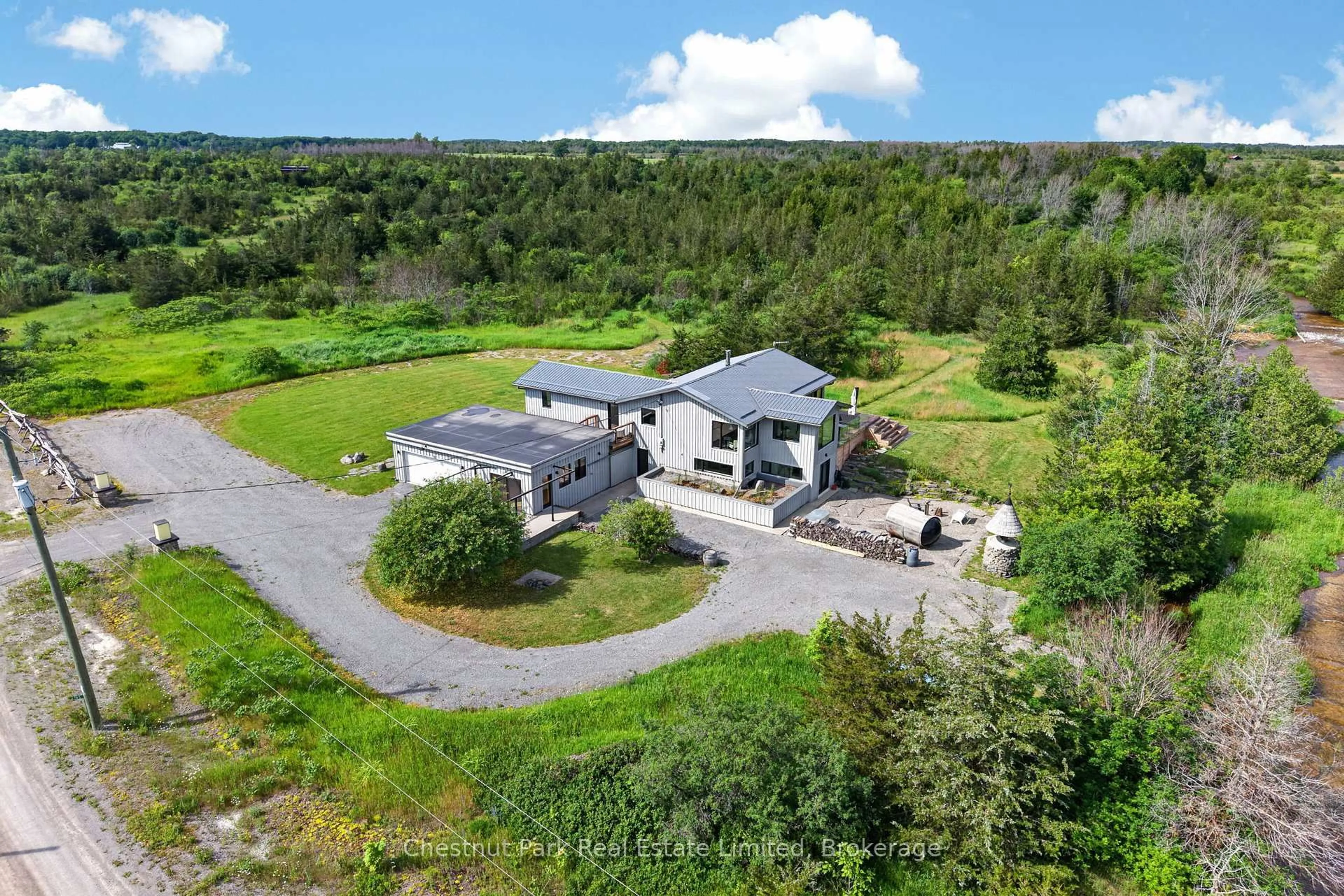 A pic from outside/outdoor area/front of a property/back of a property/a pic from drone, unknown for 745 Crowes Rd, Prince Edward County Ontario K0K 2T0