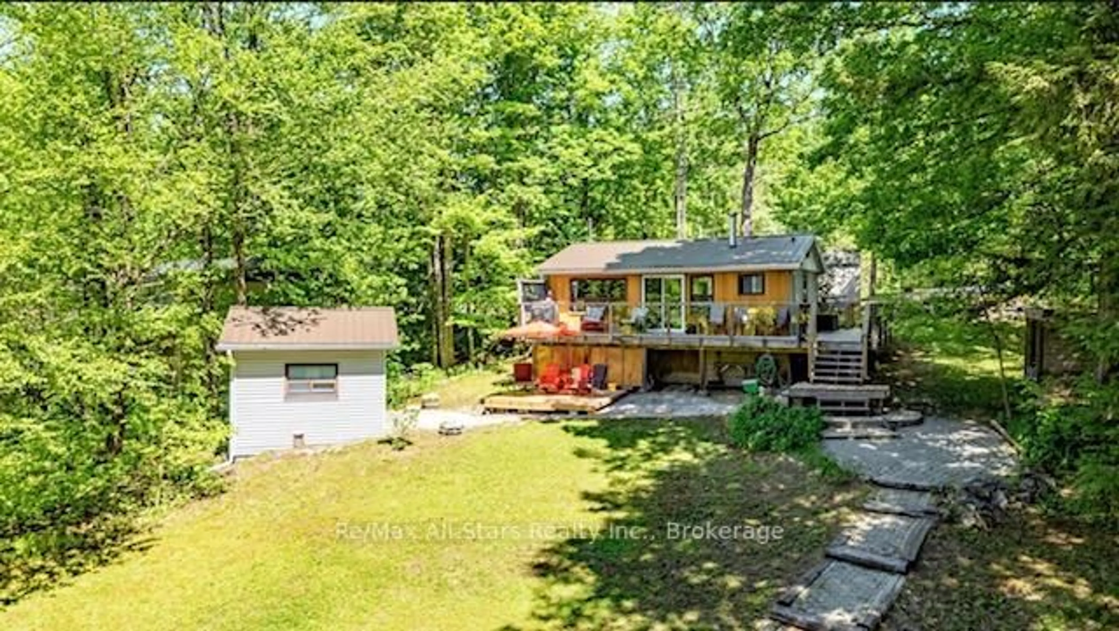A pic from outside/outdoor area/front of a property/back of a property/a pic from drone, water/lake/river/ocean view for 286 Edwina Dr, Trent Lakes Ontario K0M 1A0