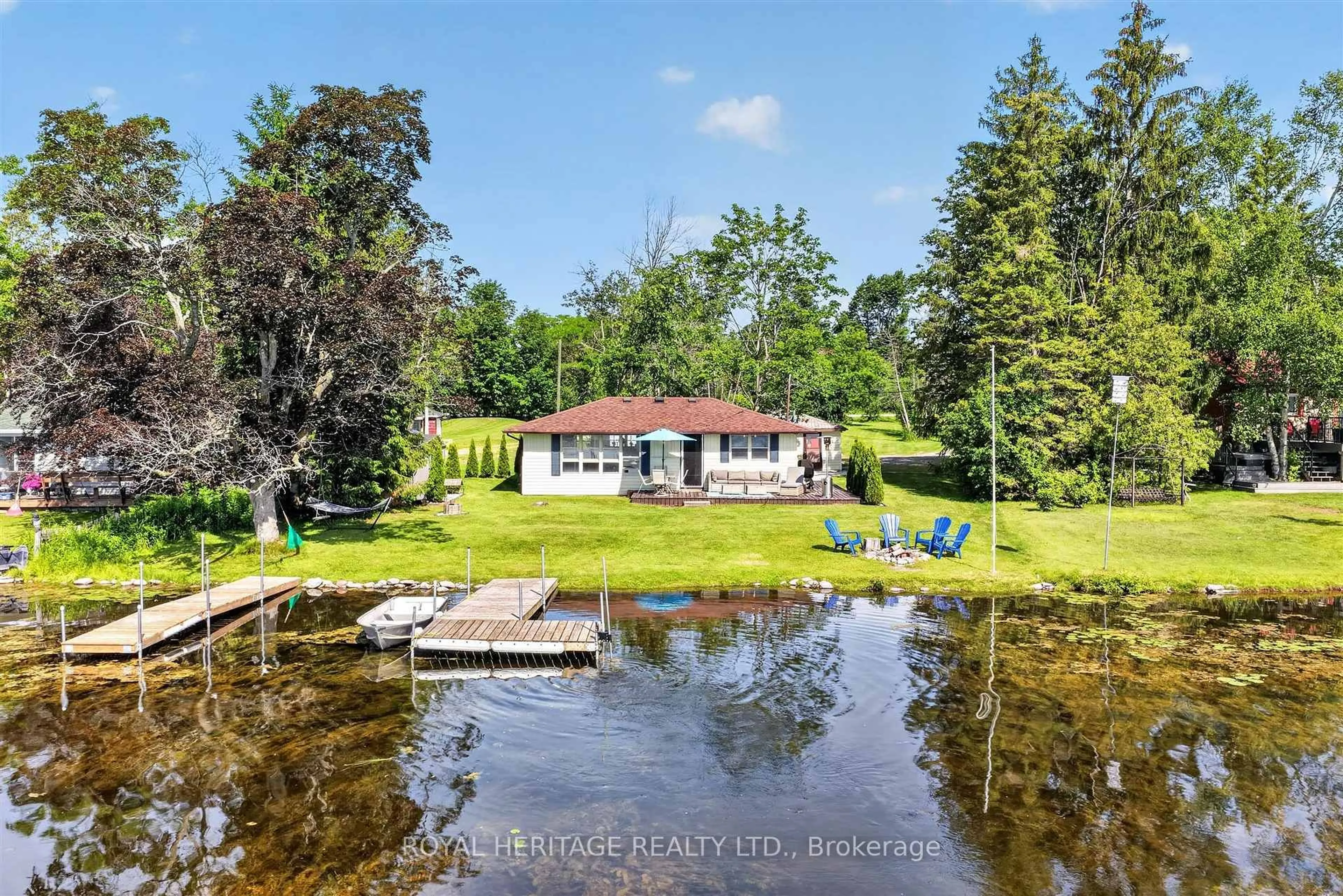 A pic from outside/outdoor area/front of a property/back of a property/a pic from drone, water/lake/river/ocean view for 100 Clearview Dr, Kawartha Lakes Ontario K0L 2W0