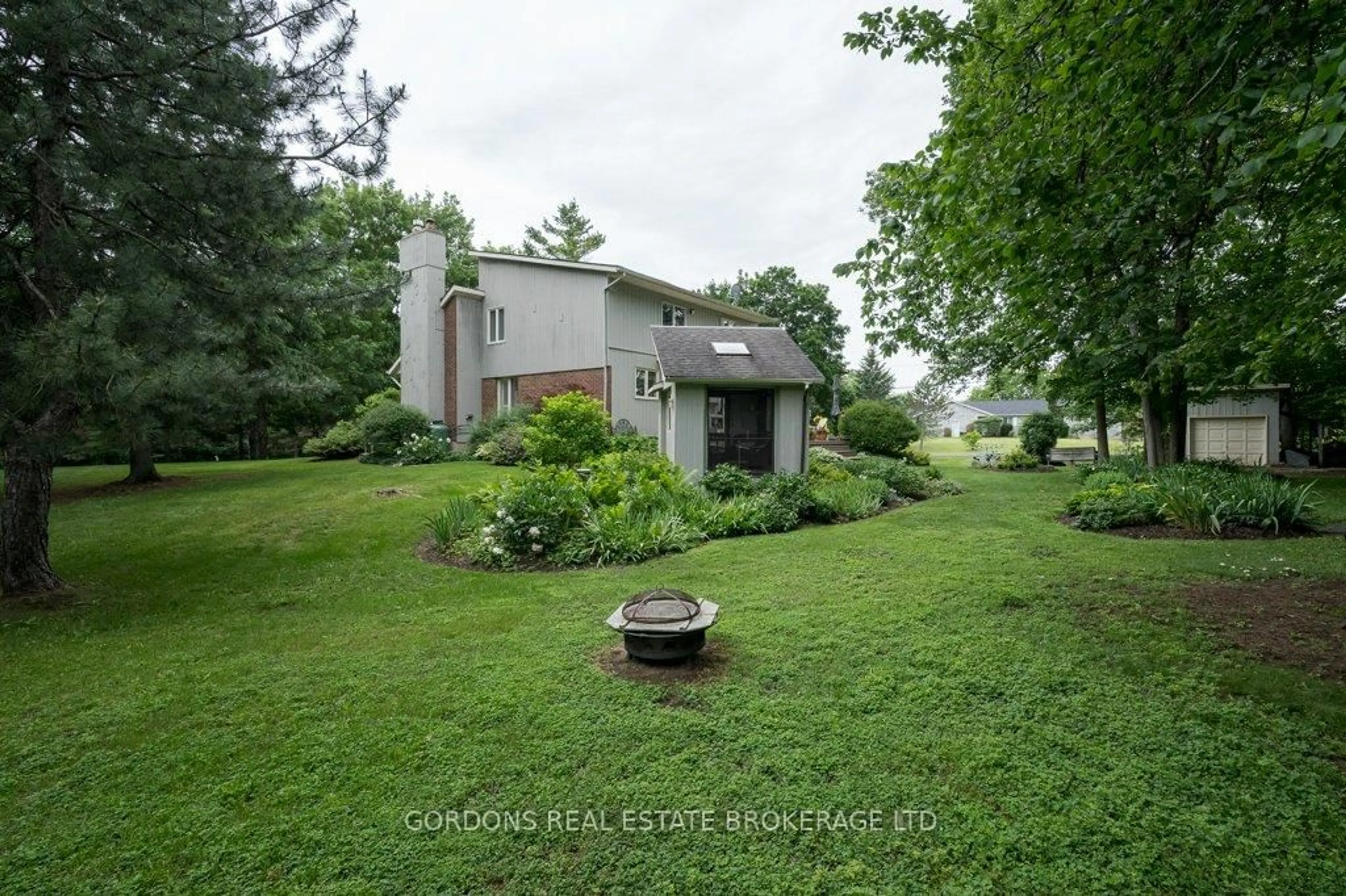 A pic from outside/outdoor area/front of a property/back of a property/a pic from drone, unknown for 5364 Holmes Rd, Inverary Ontario K0H 1X0