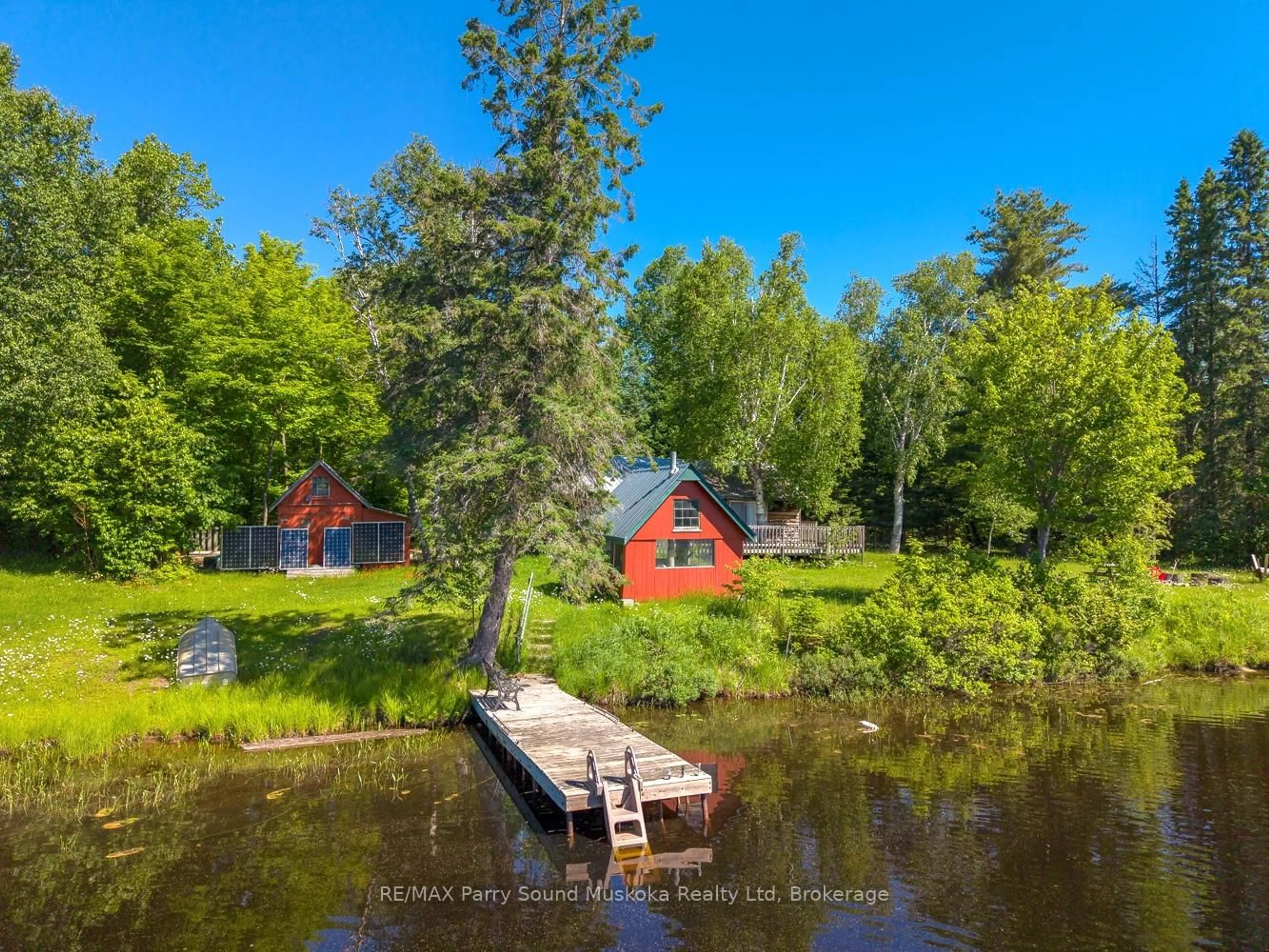 A pic from outside/outdoor area/front of a property/back of a property/a pic from drone, water/lake/river/ocean view for 472 Long Lake Rd, Parry Sound Remote Area Ontario P0H 1A0