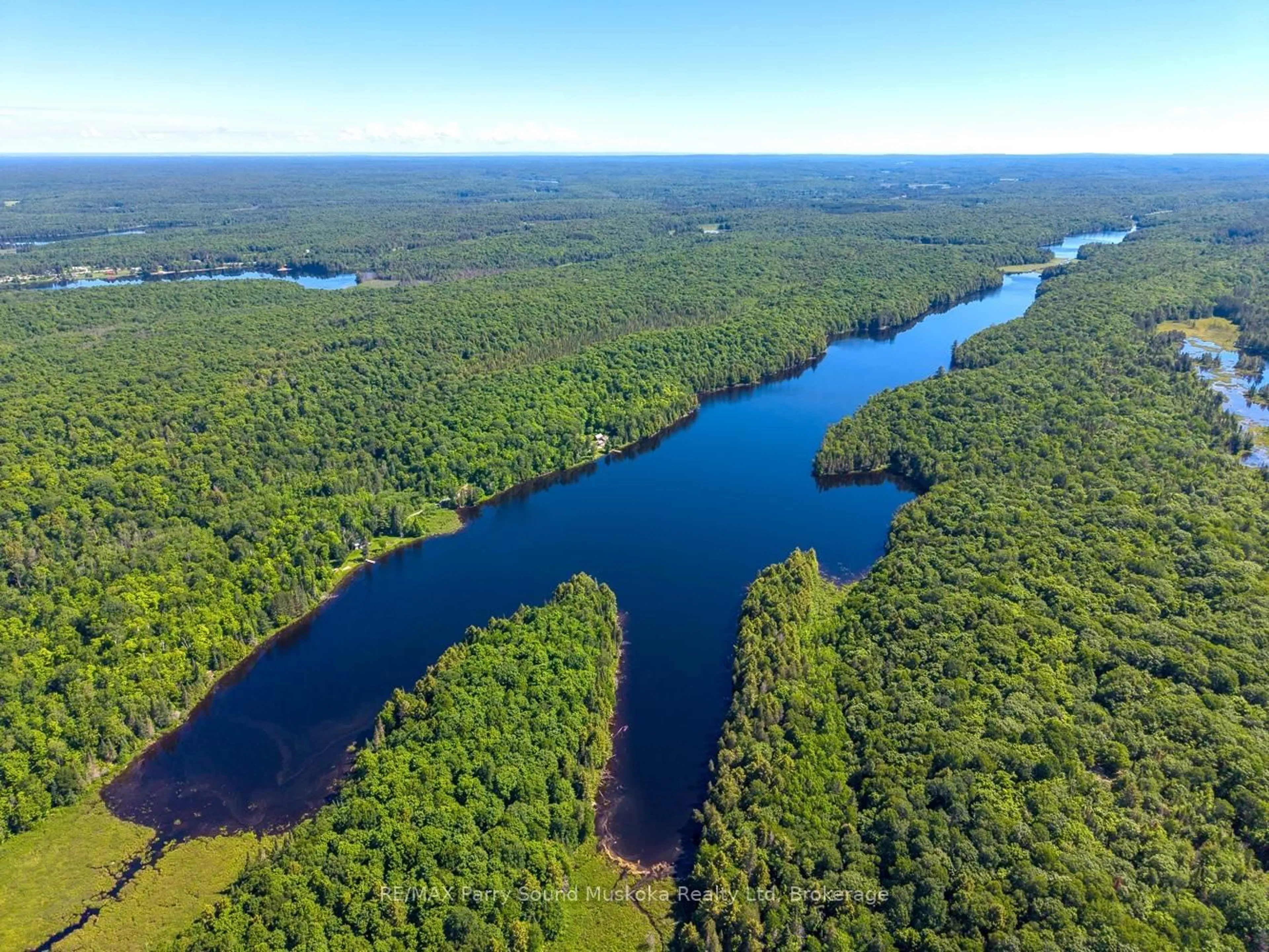 A pic from outside/outdoor area/front of a property/back of a property/a pic from drone, water/lake/river/ocean view for 472 Long Lake Rd, Parry Sound Remote Area Ontario P0H 1A0