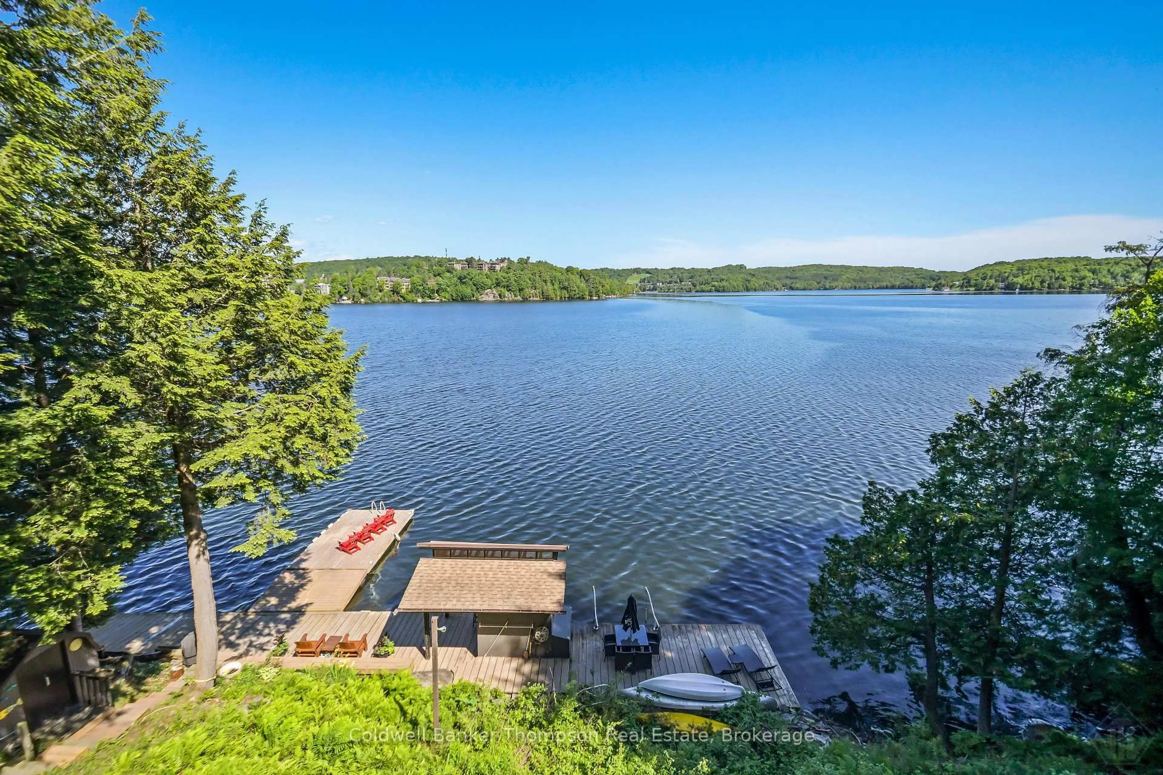 A pic from outside/outdoor area/front of a property/back of a property/a pic from drone, water/lake/river/ocean view for 1053 HEMLOCK POINT Lane, Lake of Bays Ontario P1H 2J6