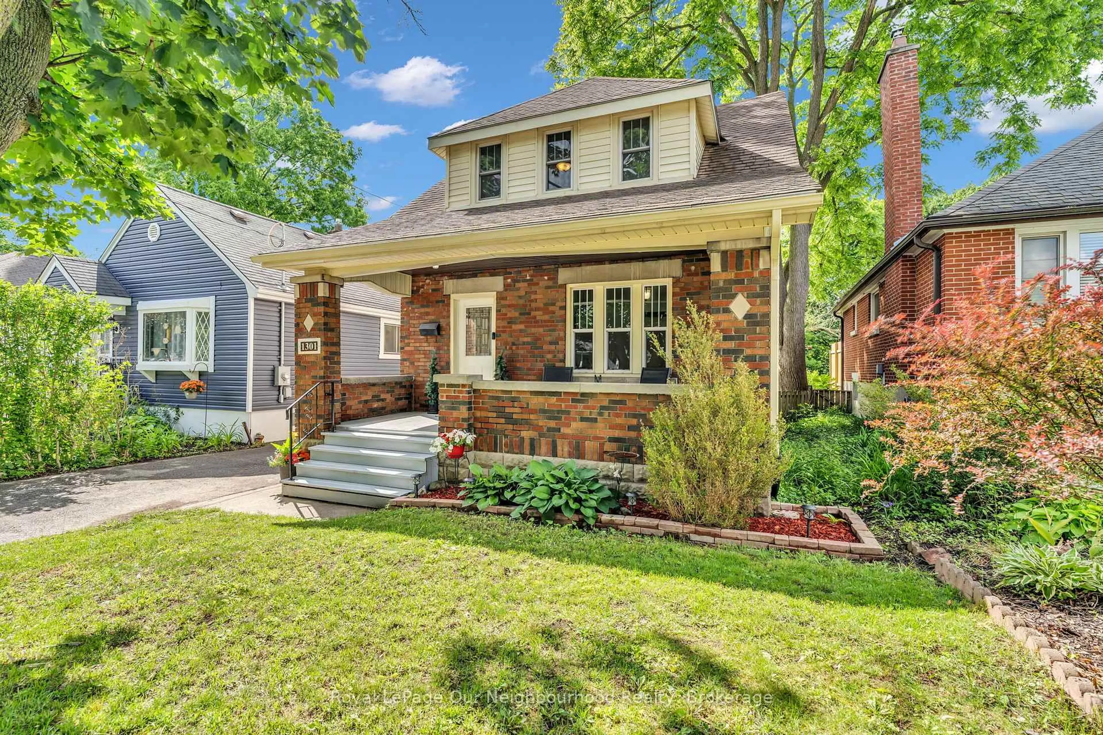 Home with brick exterior material, street for 1301 King St, London East Ontario N5W 2Y4