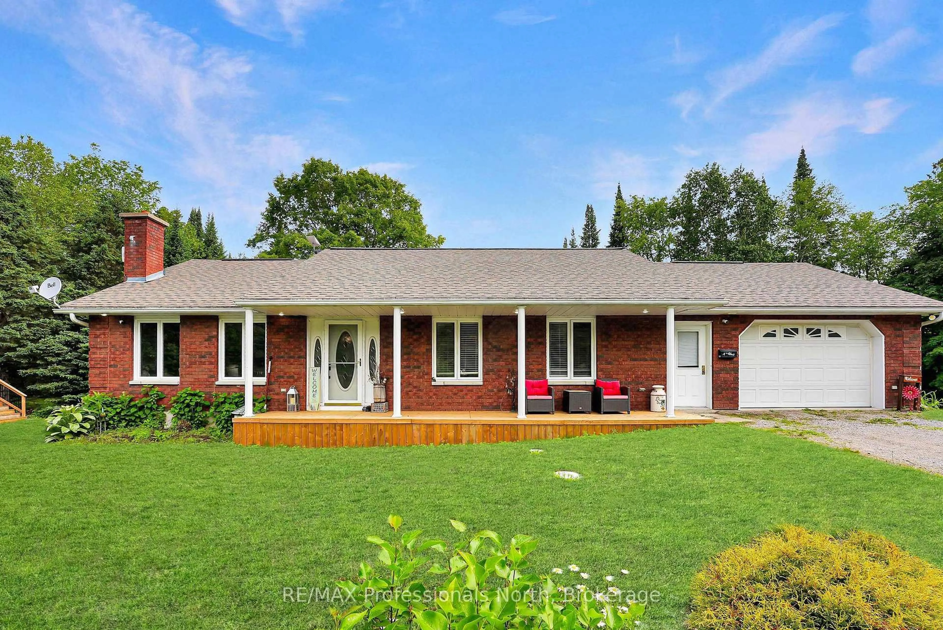 Home with brick exterior material, street for 1187 WOODS Rd, Dysart et al Ontario K0M 1S0