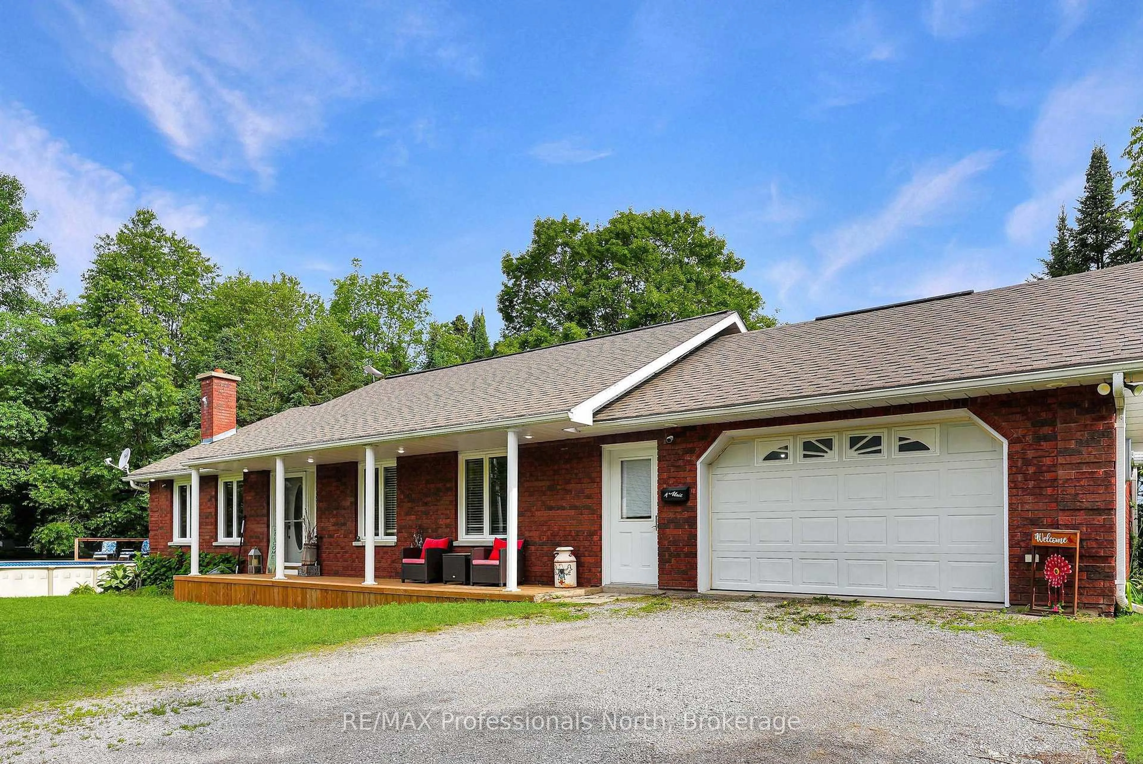 Home with brick exterior material, street for 1187 WOODS Rd, Dysart et al Ontario K0M 1S0