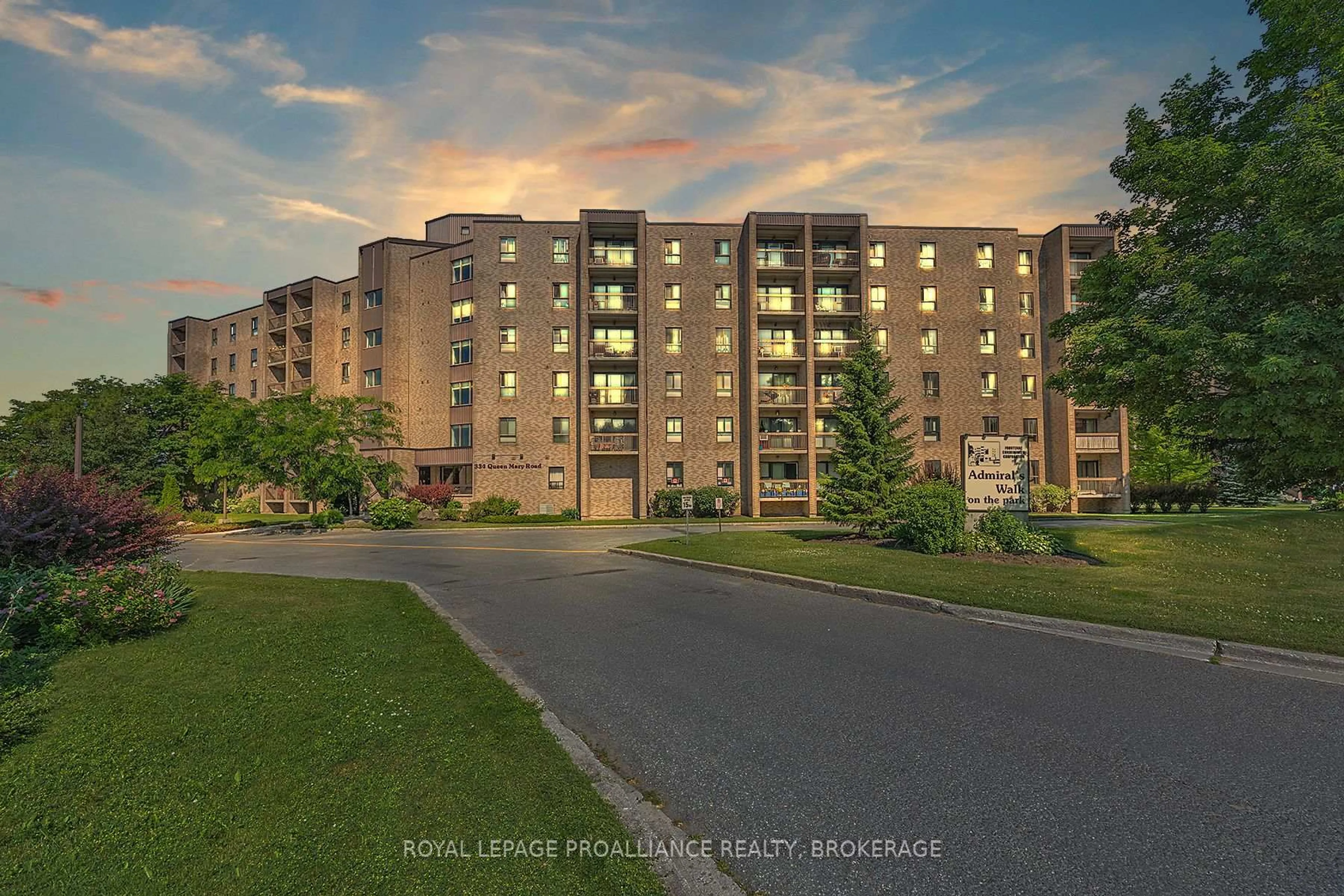 A pic from outside/outdoor area/front of a property/back of a property/a pic from drone, building for 334 Queen Mary Rd #215, Kingston Ontario K7M 7E7