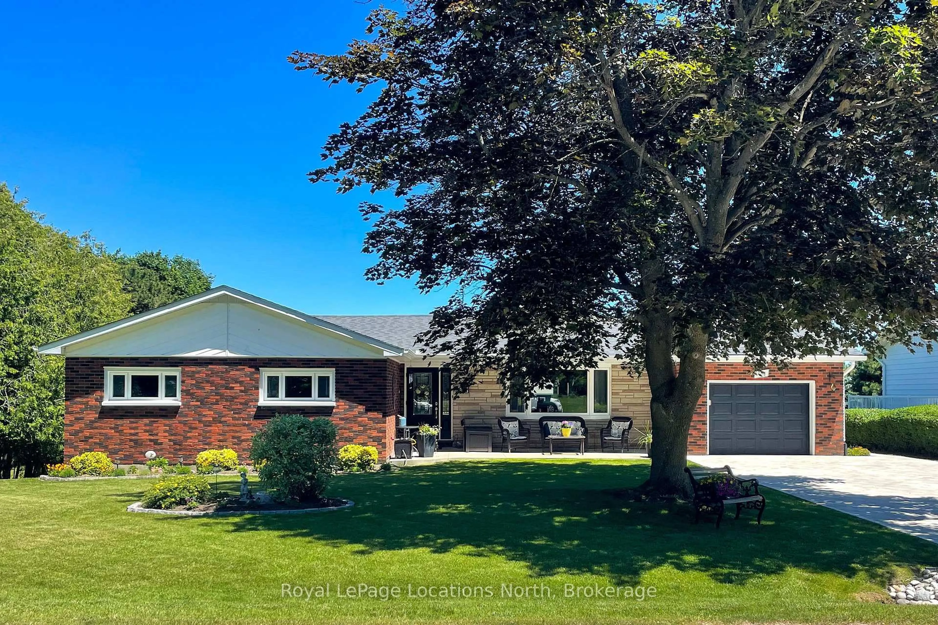 A pic from outside/outdoor area/front of a property/back of a property/a pic from drone, street for 595 Ridge Rd, Meaford Ontario N4L 1L9