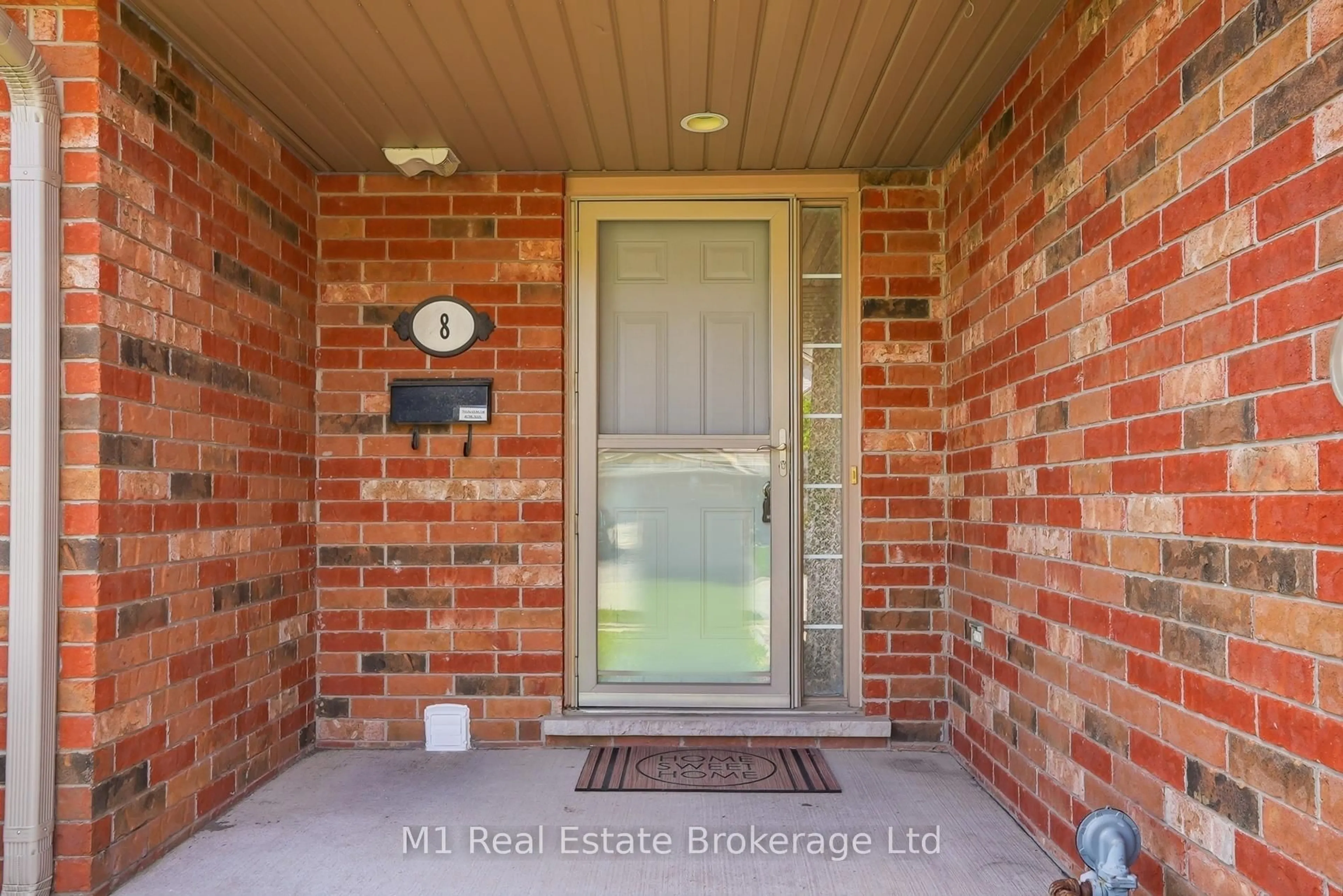 Home with brick exterior material, street for 8 Ralston Dr, Guelph Ontario N1E 0C3
