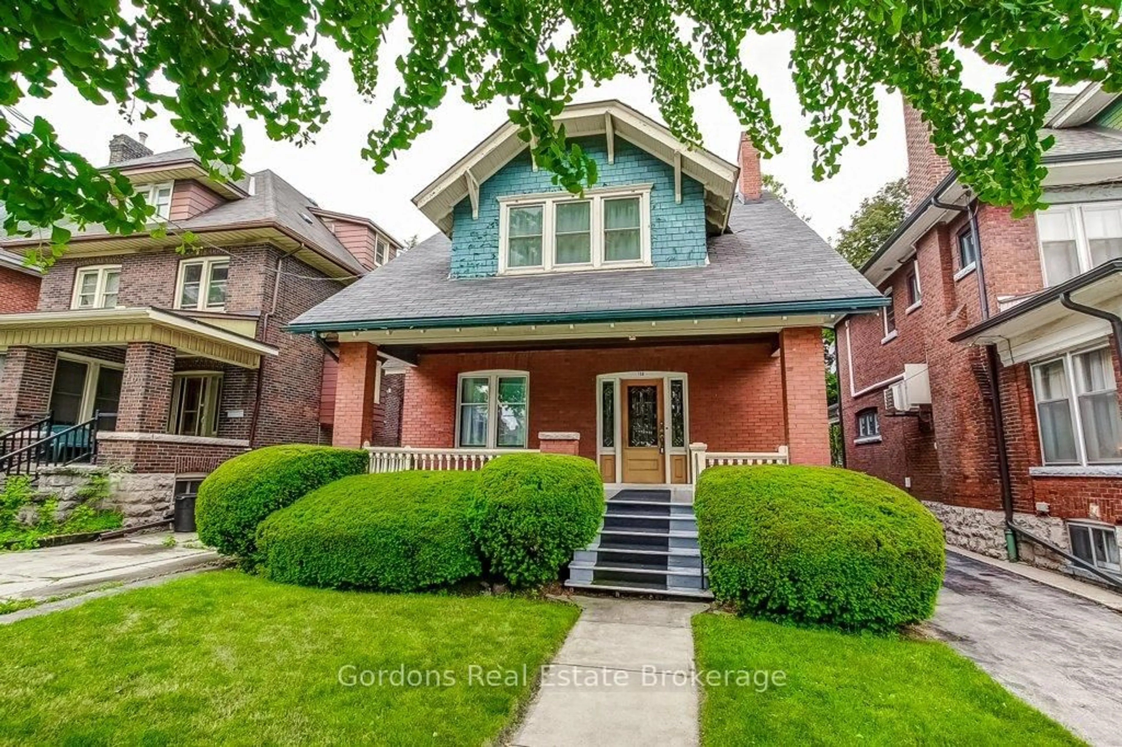 Home with brick exterior material, street for 156 Sherman Ave, Hamilton Ontario L8M 2P9