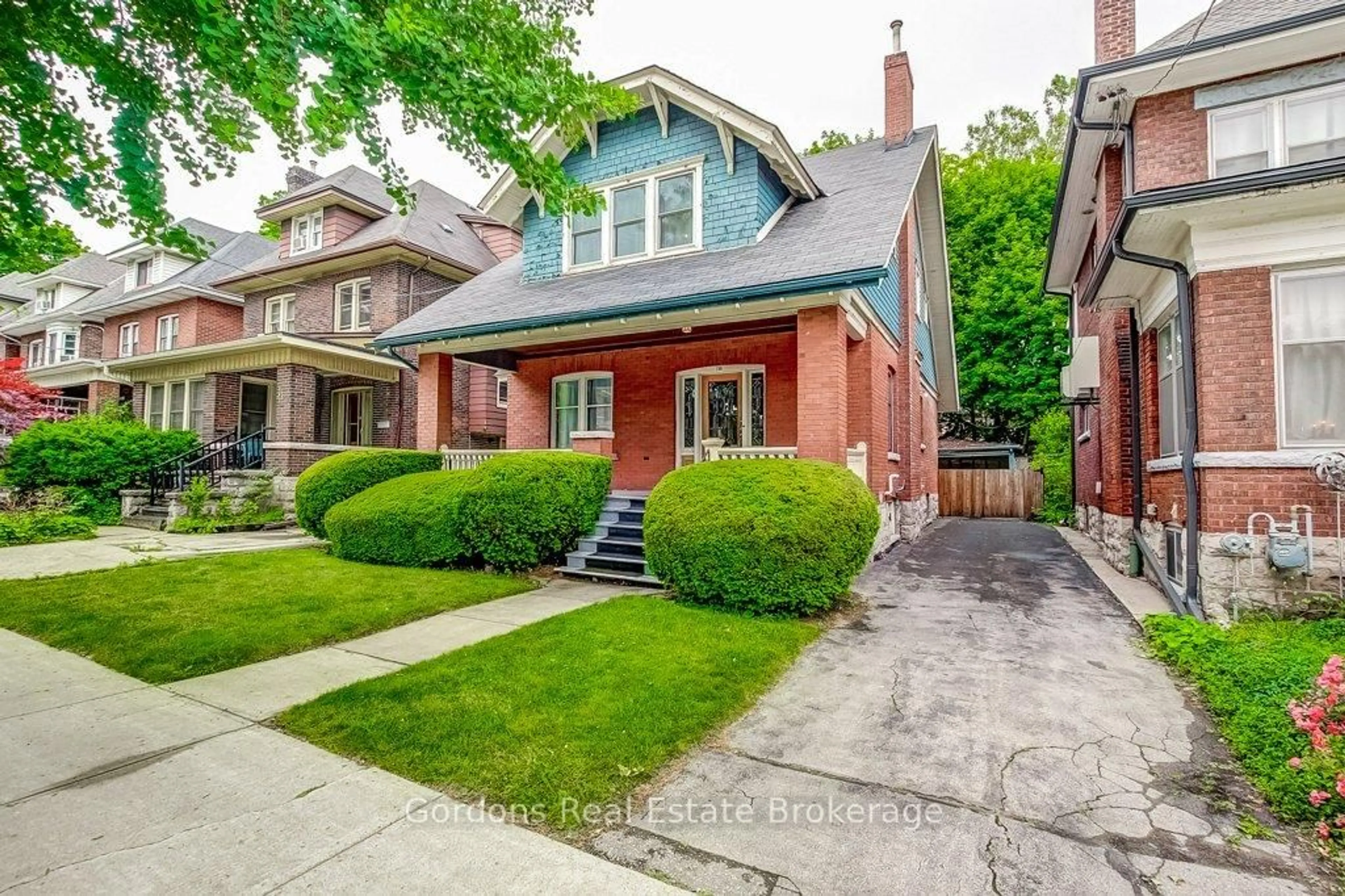 Home with brick exterior material, street for 156 Sherman Ave, Hamilton Ontario L8M 2P9