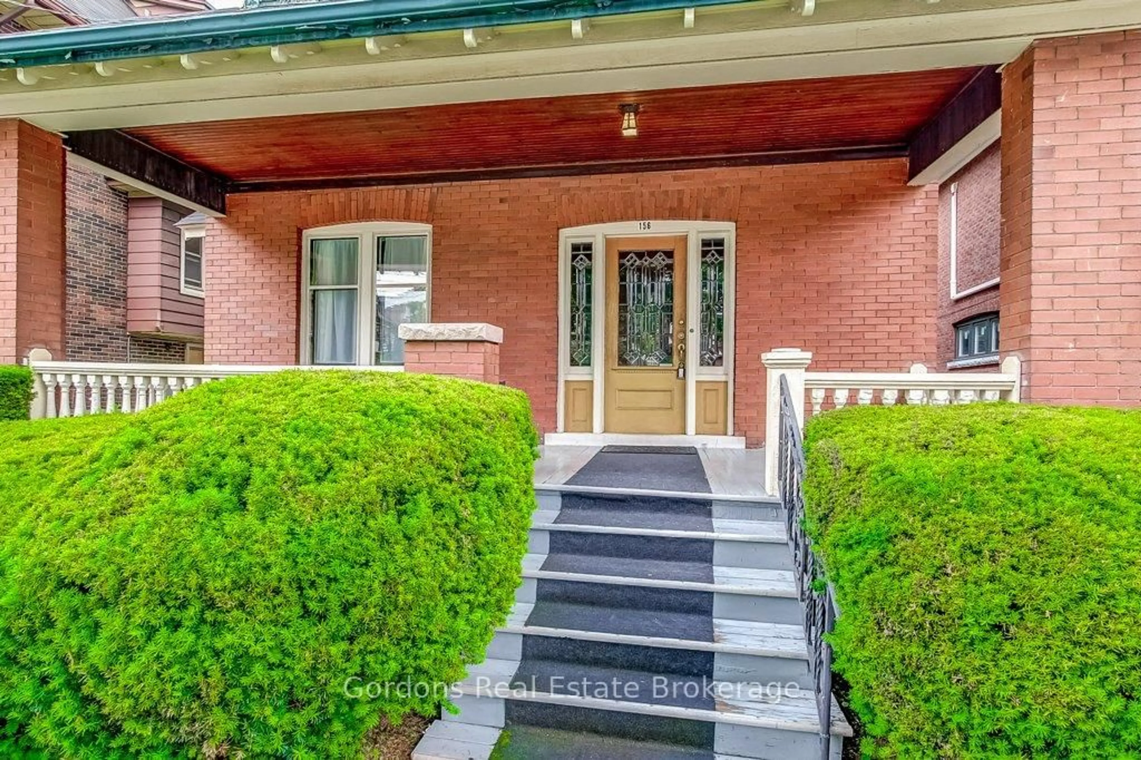 Home with brick exterior material, street for 156 Sherman Ave, Hamilton Ontario L8M 2P9