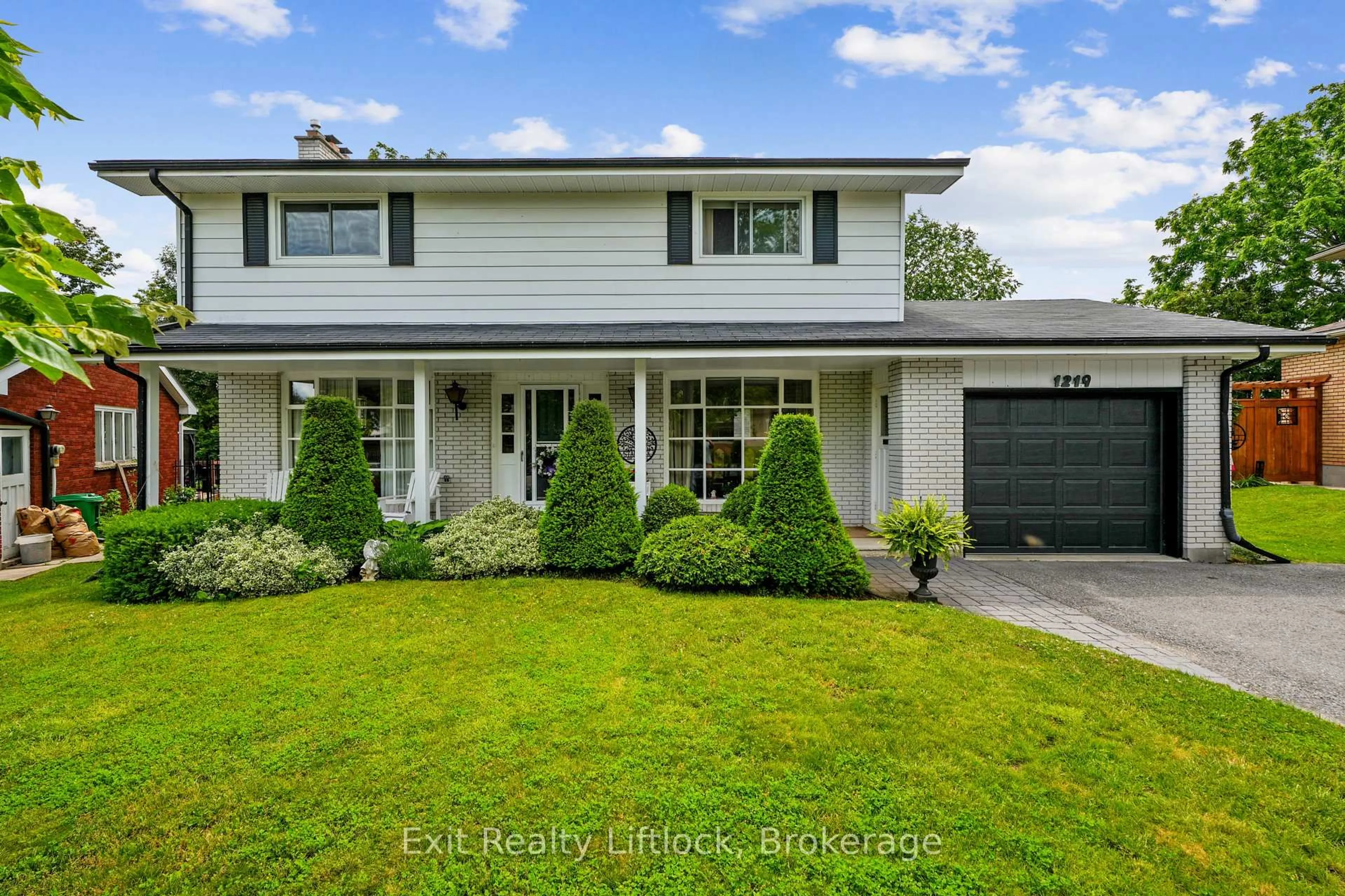 Home with vinyl exterior material, street for 1219 Edmison Dr, Peterborough Ontario K9H 6V2