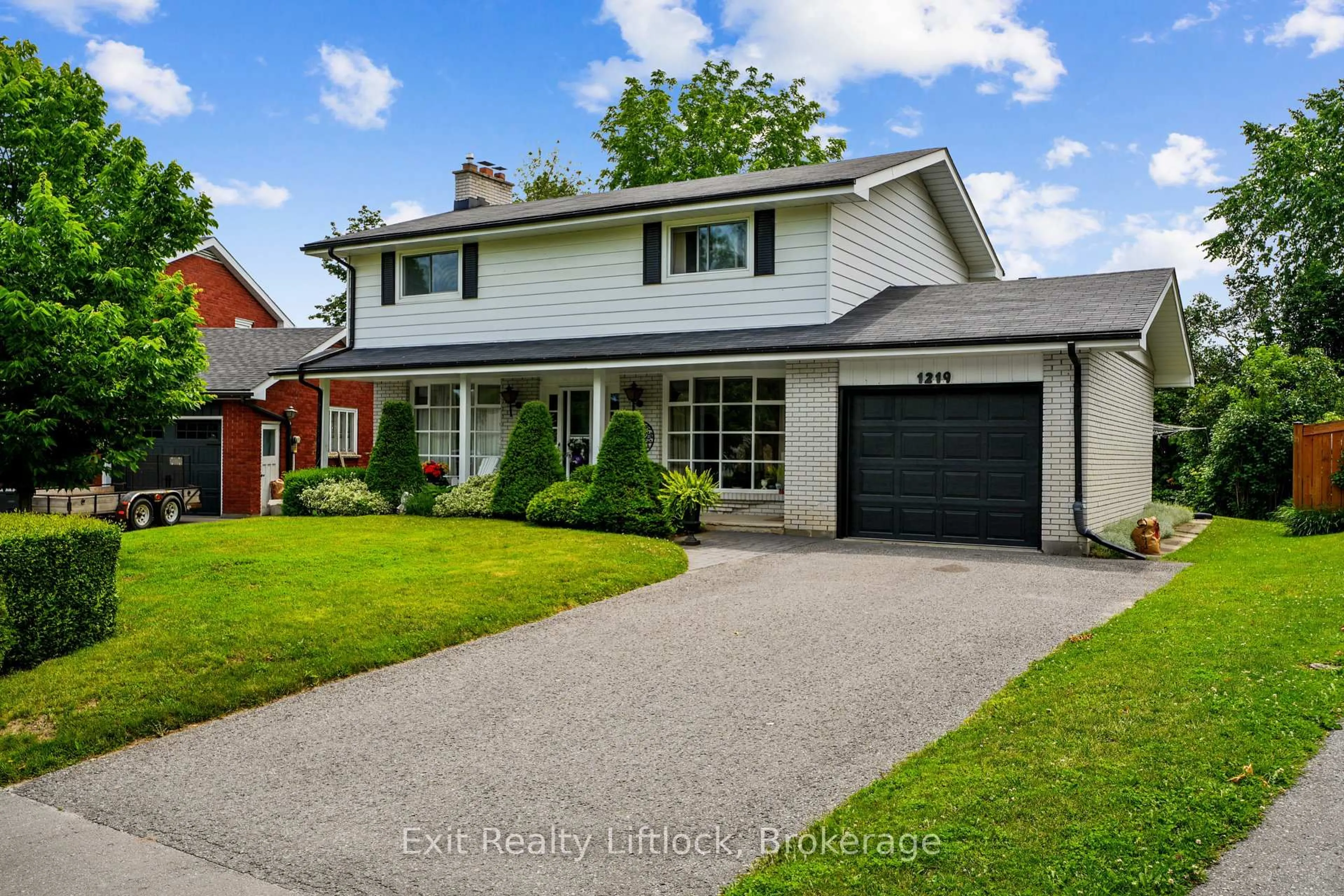 Home with brick exterior material, street for 1219 Edmison Dr, Peterborough Ontario K9H 6V2