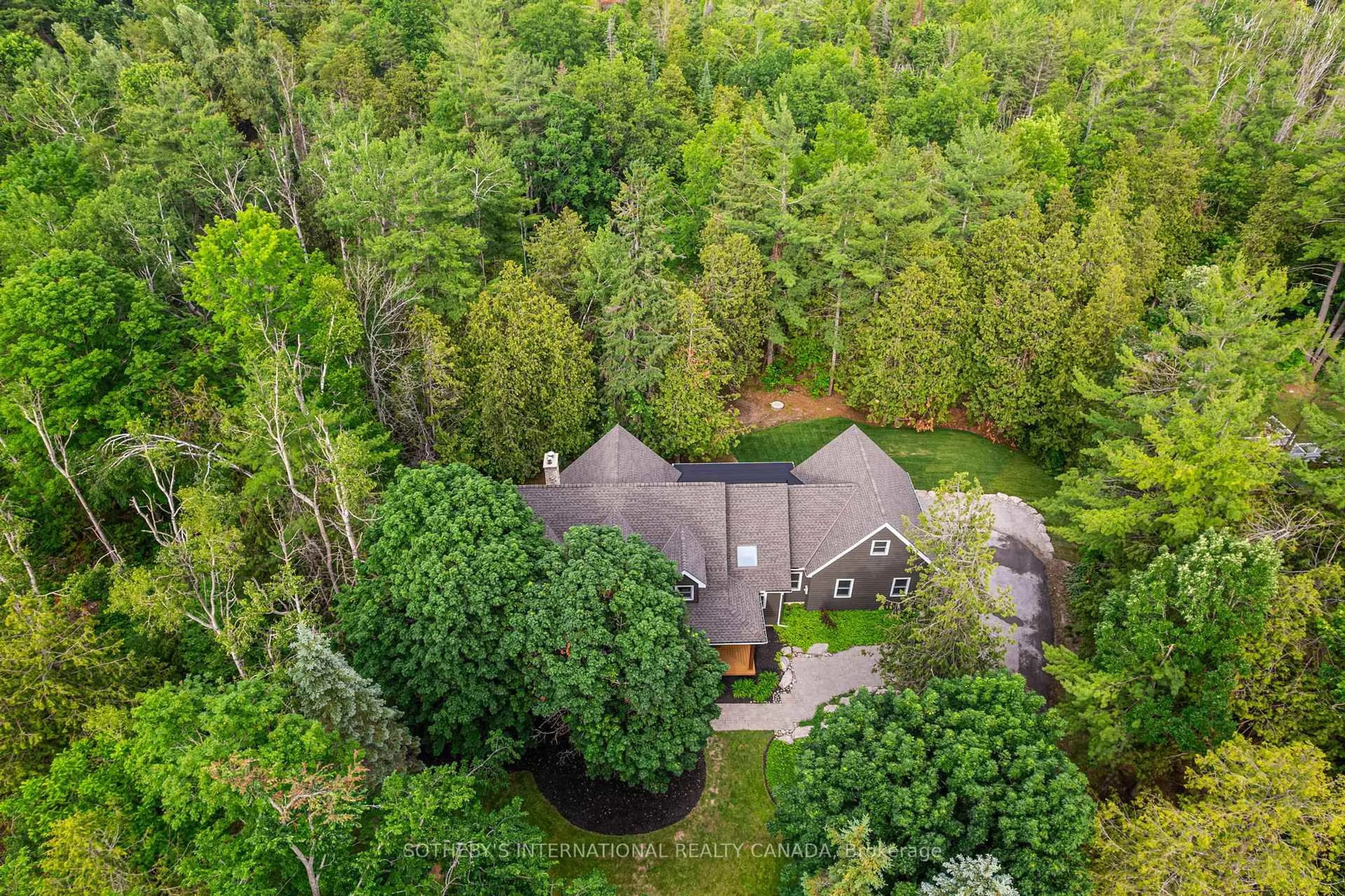 A pic from outside/outdoor area/front of a property/back of a property/a pic from drone, forest/trees view for 136 Princes St, Kawartha Lakes Ontario K0M 1N0