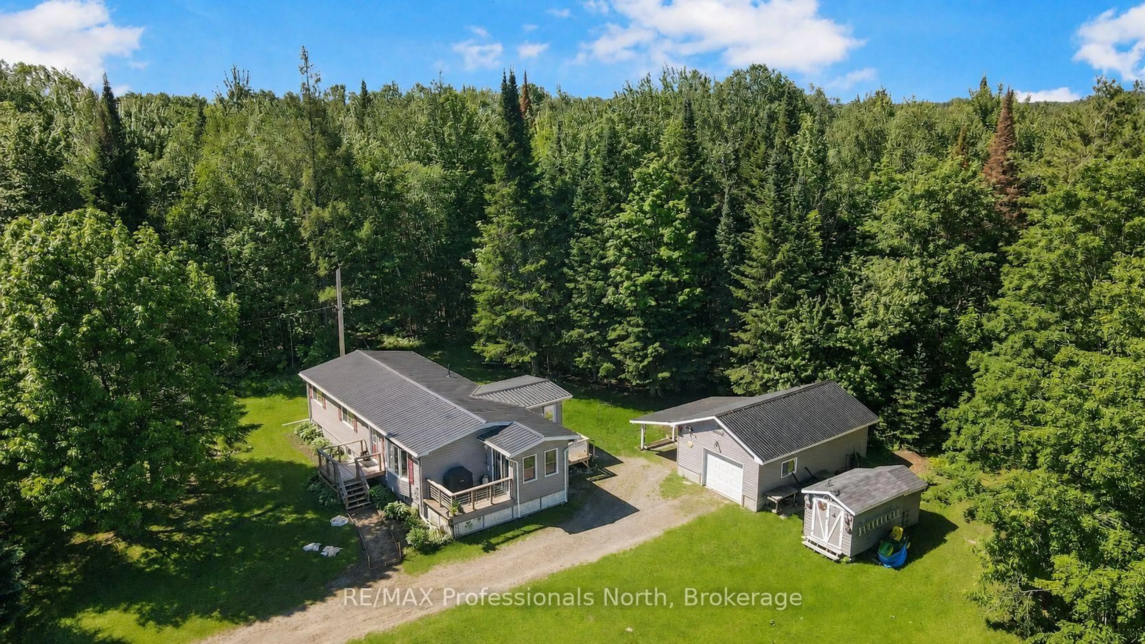 A pic from outside/outdoor area/front of a property/back of a property/a pic from drone, unknown for 3389 Gelert Rd, Minden Hills Ontario K0M 2K0