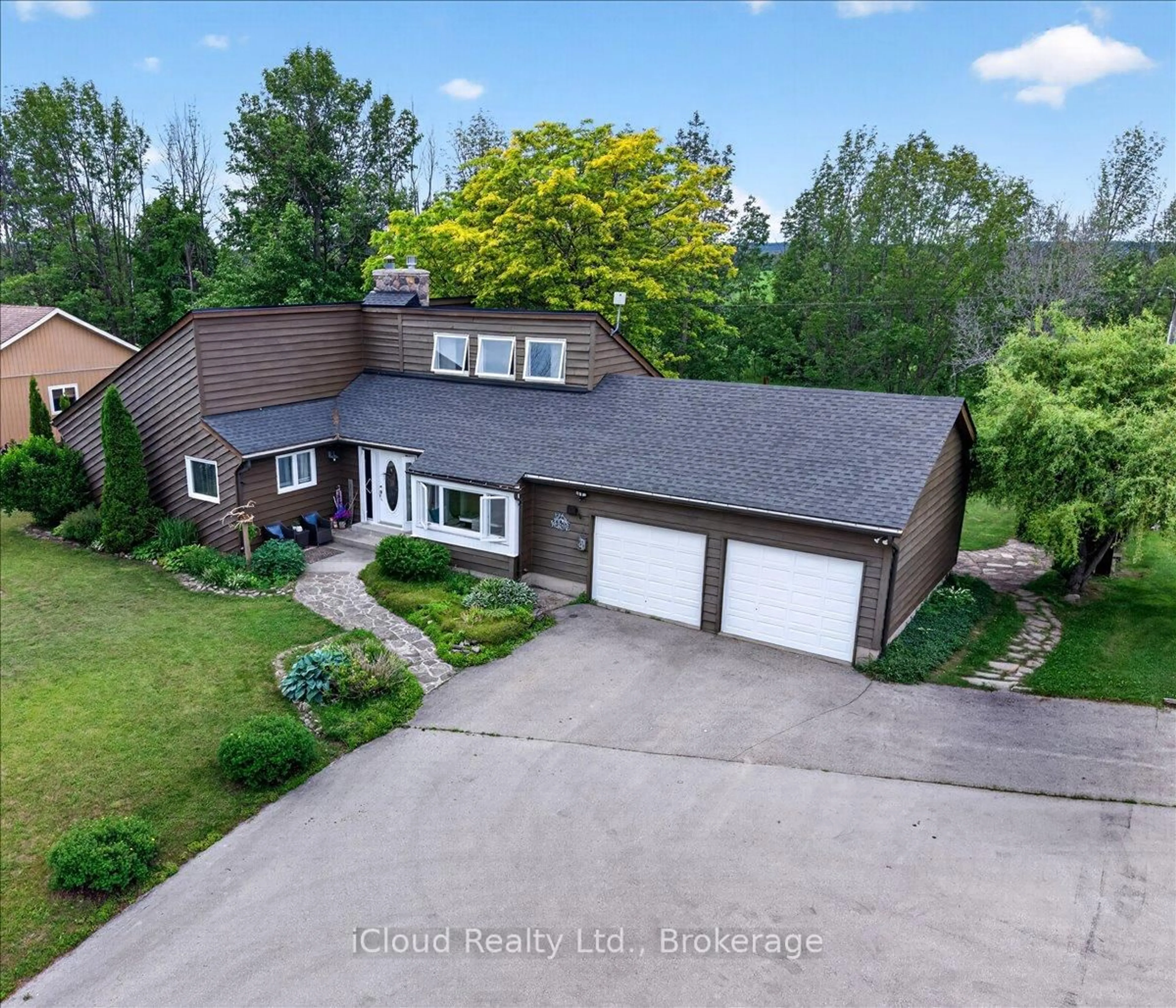 A pic from outside/outdoor area/front of a property/back of a property/a pic from drone, unknown for 319378 Grey Road 1, Georgian Bluffs Ontario N0H 1S0