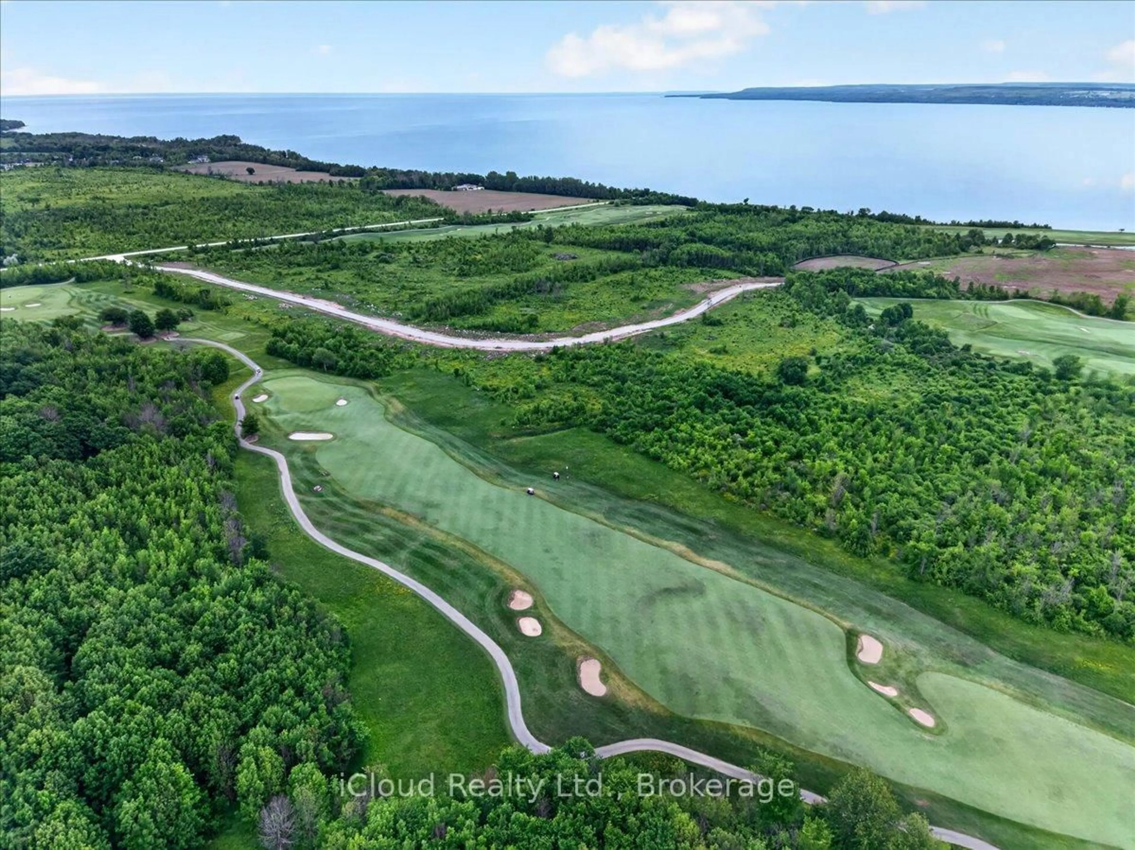 A pic from outside/outdoor area/front of a property/back of a property/a pic from drone, water/lake/river/ocean view for 319378 Grey Road 1, Georgian Bluffs Ontario N0H 1S0